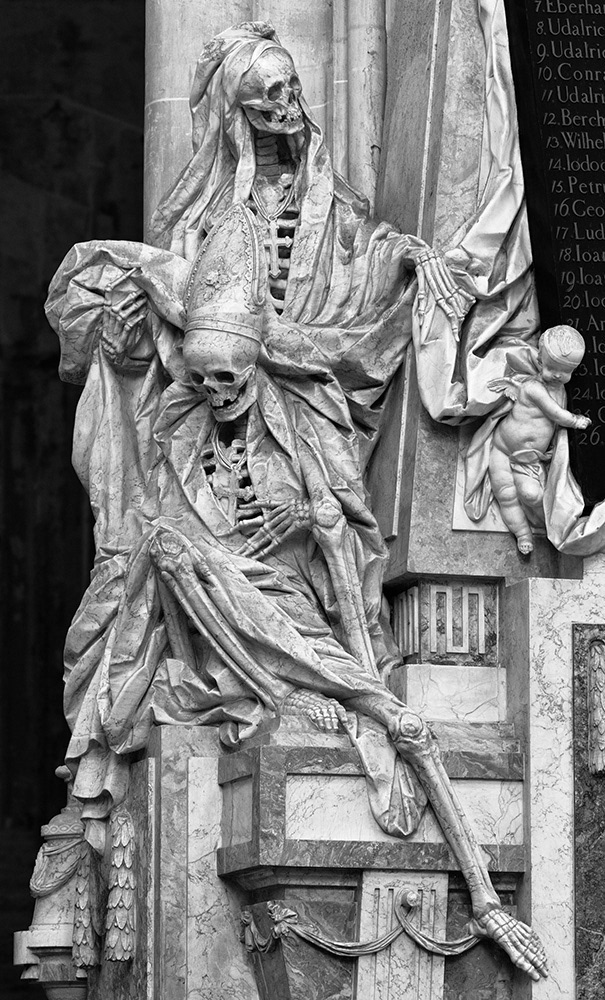 Two skeletal but still sumptuously dressed abbots in a monastery church serve as a reminder of the transience of life.