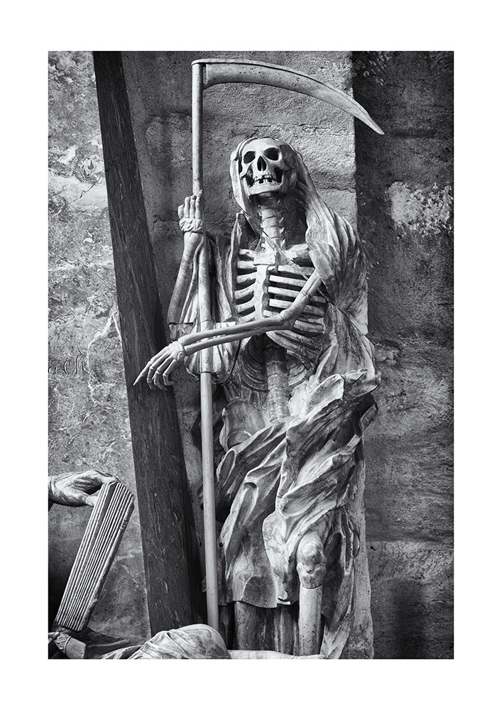 Death, depicted as a skeleton dressed in a robe and hood, holding a scythe, refers to the transience of earthly endeavors.