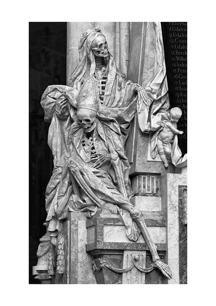 Two skeletal but still sumptuously dressed abbots in a monastery church serve as a reminder of the transience of life.