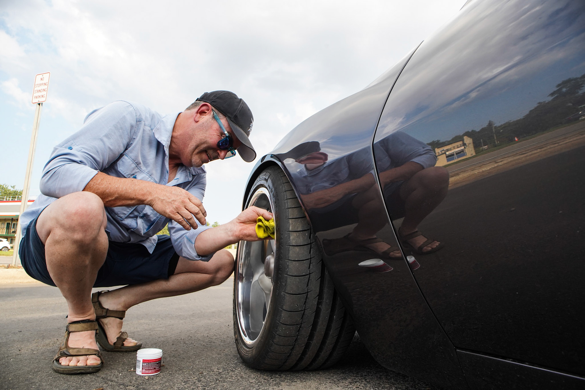 Mark Allen, 58, of Oxford cleans his 1973 AMX in Royal Oak on Thursday, August 19, 2021. The Woodward Dream Cruise, the world's largest one-day car event is returning after taking a break due to COVID-19.