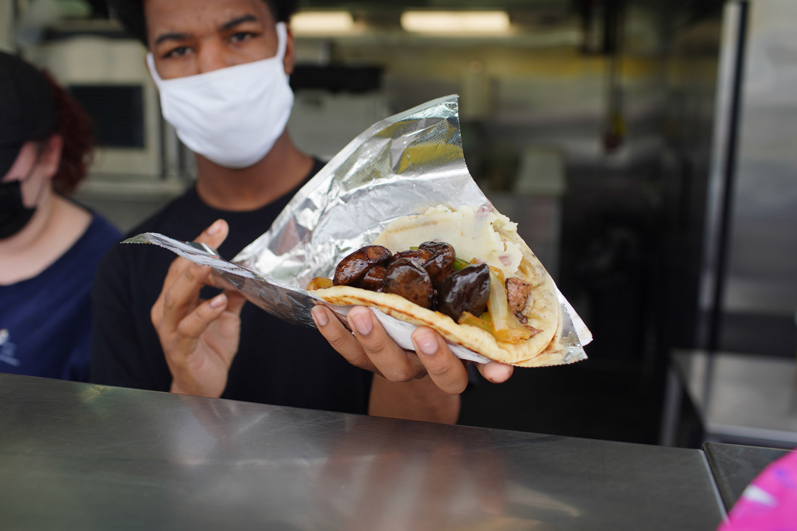 Pickle Barrel pita at ‘Fair Food Mania’ in Allegan, Michigan on Saturday, May 15, 2021. Visitors get a chance to get some delicious fair food from several different concessions while remaining in their vehicles. (Rodney Coleman-Robinson | MLive.com)
