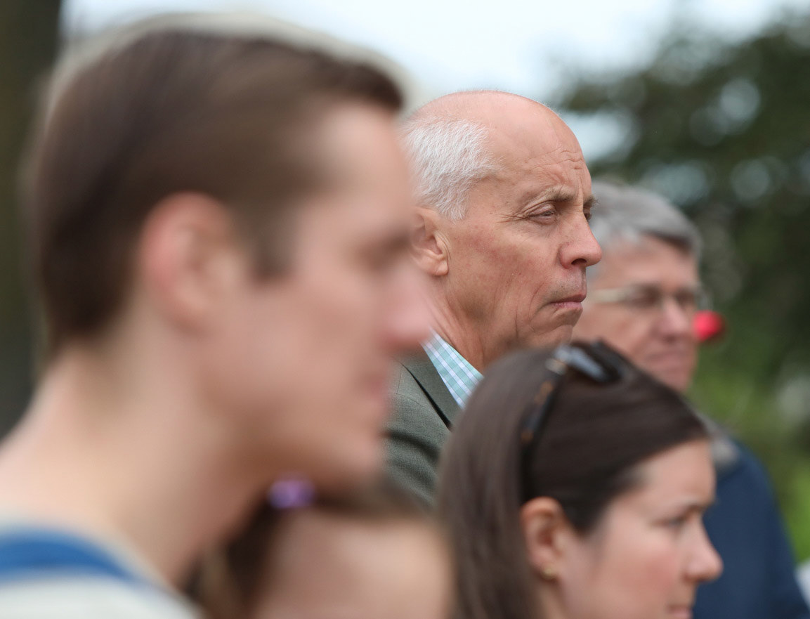 Mayor David Anderson listens as the Kalamazoo Marine Corps League honors fallen soldiers from the Kalamazoo County on Memorial day in Kalamazoo, Michigan on Friday, May 28, 2021. The group gathered at the Robert Cook Veterans Park to read over 1200 names from Kalamazoo County who lost their lives in wars, from the Mexican War through the current conflicts in Iraq and Afghanistan. (Rodney Coleman-Robinson | MLive.com)