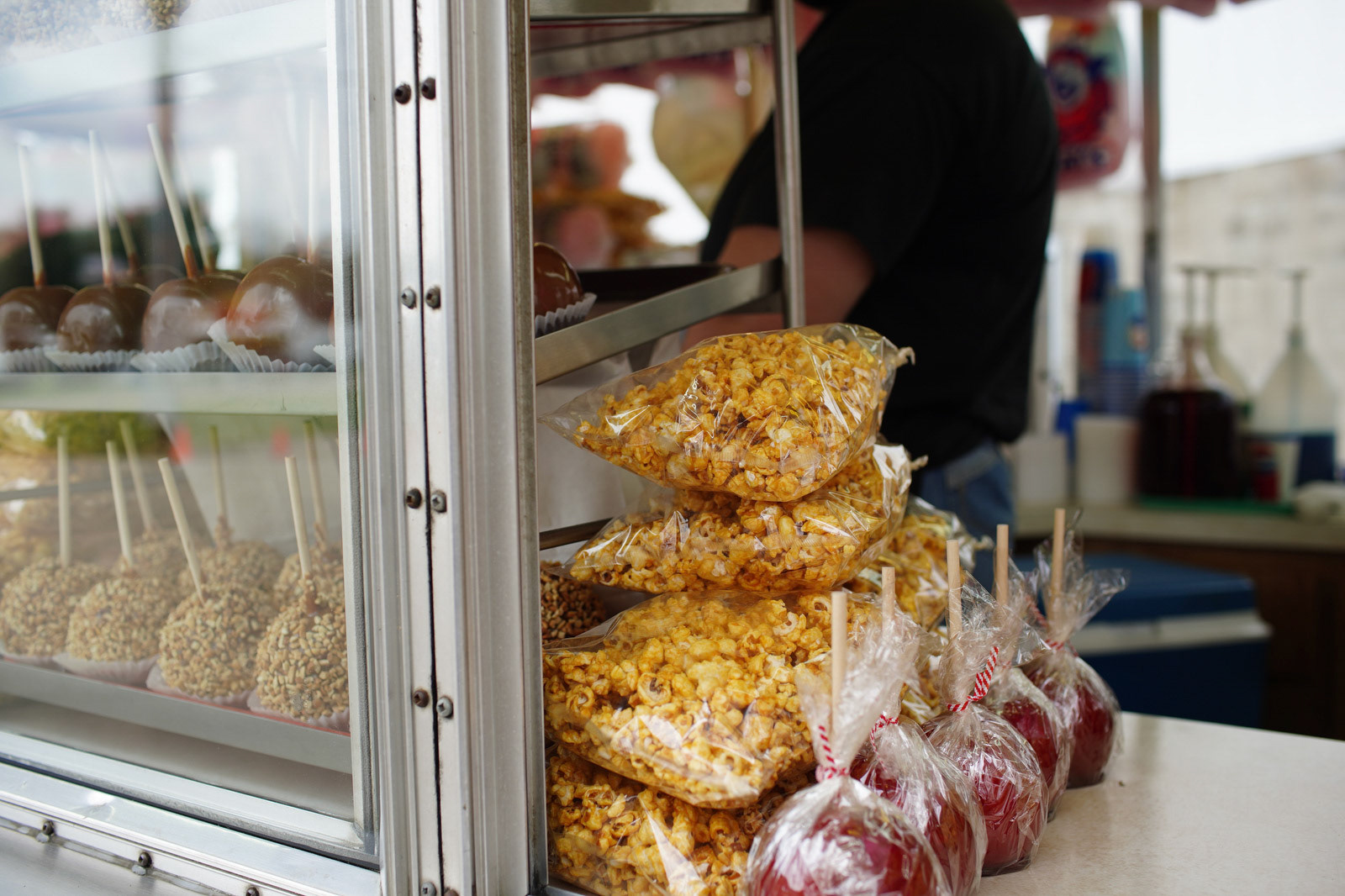 A flock of vehicles make their way around Allegan County Fairgrounds throughout the day for ‘Fair Food Mania’ in Allegan, Michigan on Saturday, May 15, 2021. Visitors get a chance to get some delicious fair food from several different concessions while remaining in their vehicles. (Rodney Coleman-Robinson | MLive.com)