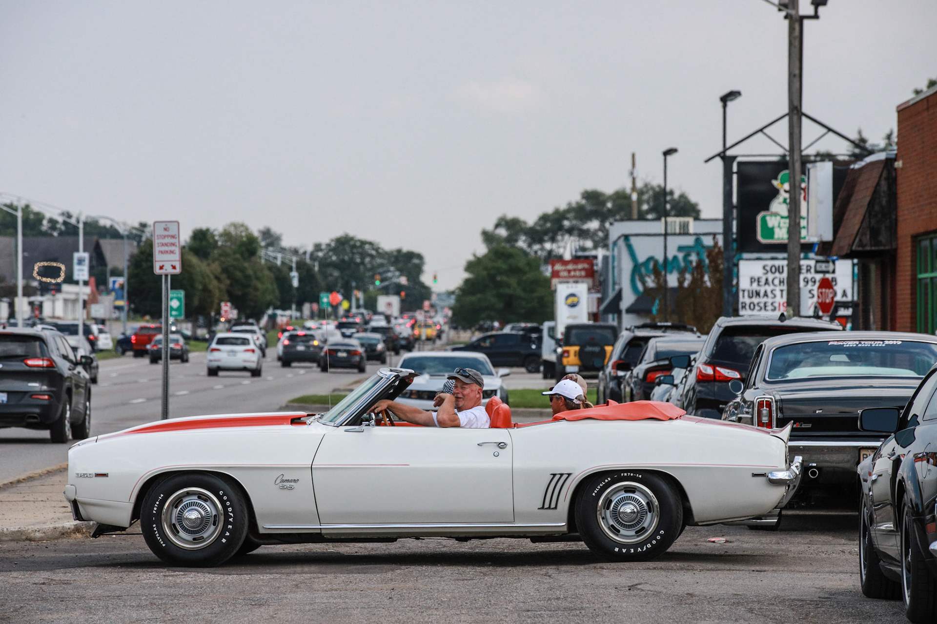 Classic cars line up in parking lots ahead of the Woodward Dream Cruise in Royal Oak on Thursday, August 19, 2021. The Woodward Dream Cruise, the world's largest one-day car event is returning after taking a break due to COVID-19.