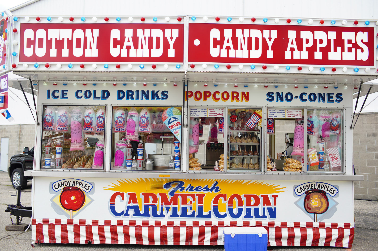 A flock of vehicles make their way around Allegan County Fairgrounds throughout the day for ‘Fair Food Mania’ in Allegan, Michigan on Saturday, May 15, 2021. Visitors get a chance to get some delicious fair food from several different concessions while remaining in their vehicles. (Rodney Coleman-Robinson | MLive.com)