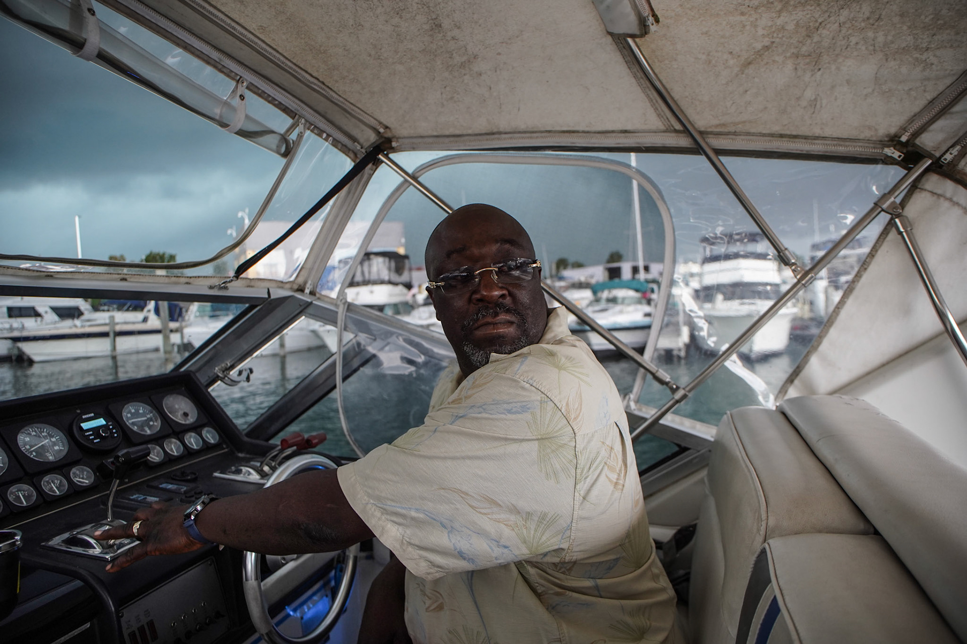 Raymond Mccants, 52, of Detroit backs his boat up to the dock at Riverside Marina in Detroit on Friday, August 27, 2021. Raymond Mccants II keeps his boat at Riverside Marina, a black owned marina in the city of Detroit.