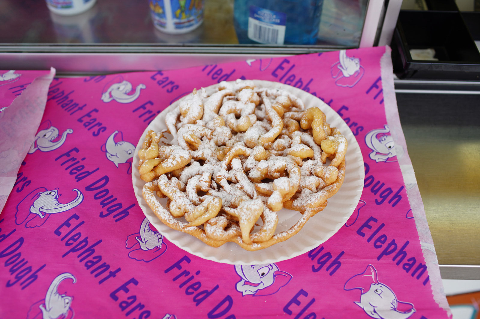 A funnel cake from the concessions at ‘Fair Food Mania’ in Allegan, Michigan on Saturday, May 15, 2021. Visitors get a chance to get some delicious fair food from several different concessions while remaining in their vehicles. (Rodney Coleman-Robinson | MLive.com)