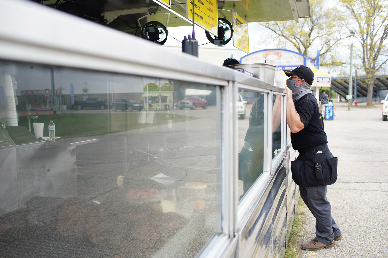 A flock of vehicles make their way around Allegan County Fairgrounds throughout the day for ‘Fair Food Mania’ in Allegan, Michigan on Saturday, May 15, 2021. Visitors get a chance to get some delicious fair food from several different concessions while remaining in their vehicles. (Rodney Coleman-Robinson | MLive.com)