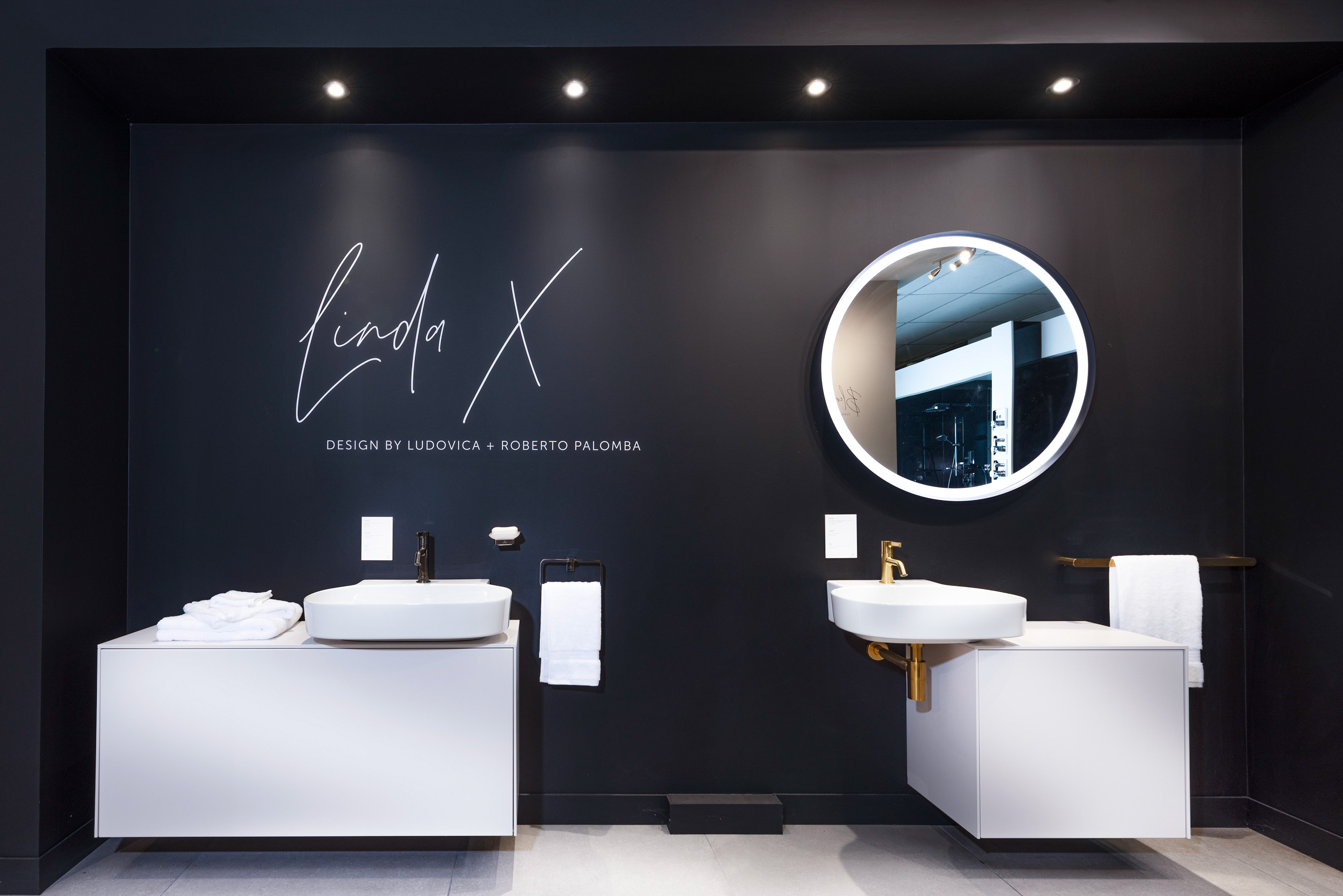 Compact bathroom design with floating storage unit.