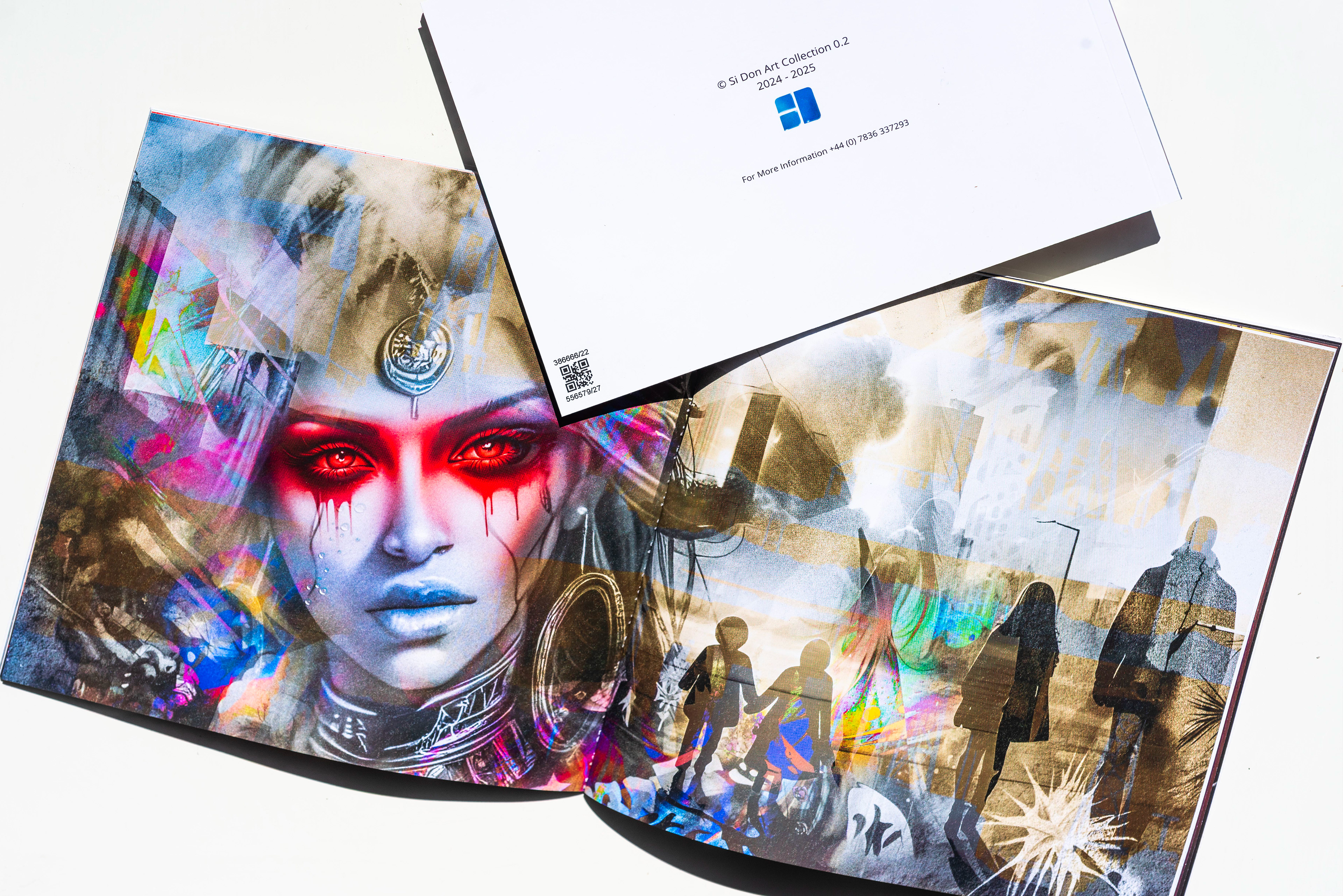 Art book open to colorful artwork featuring a mystical woman with glowing red eyes and children holding hands, creating a surreal, enigmatic tone.