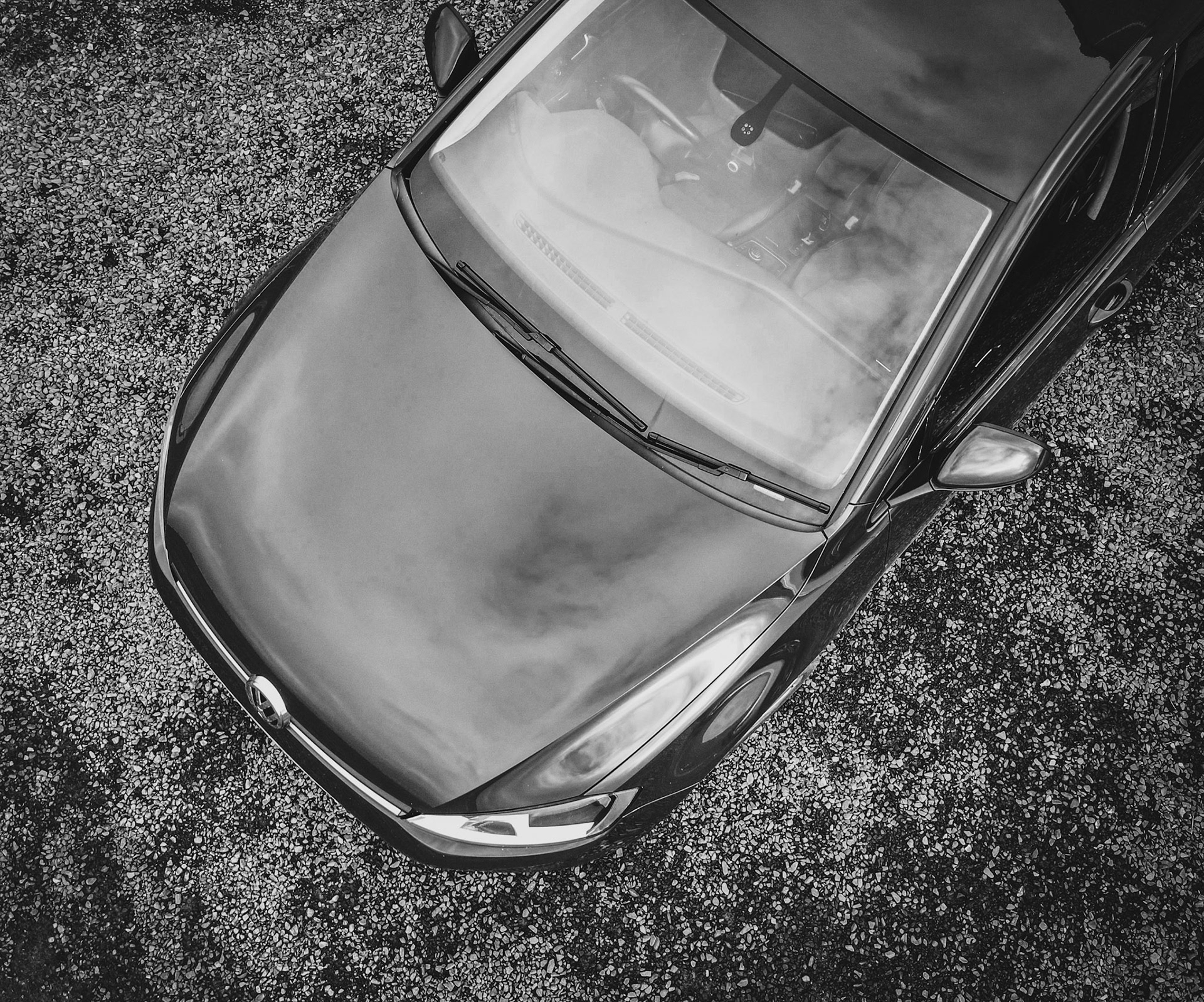 Monochrome top down view of car