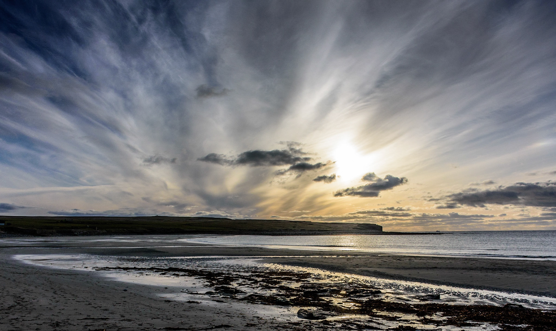 Low sun and wind in the sky