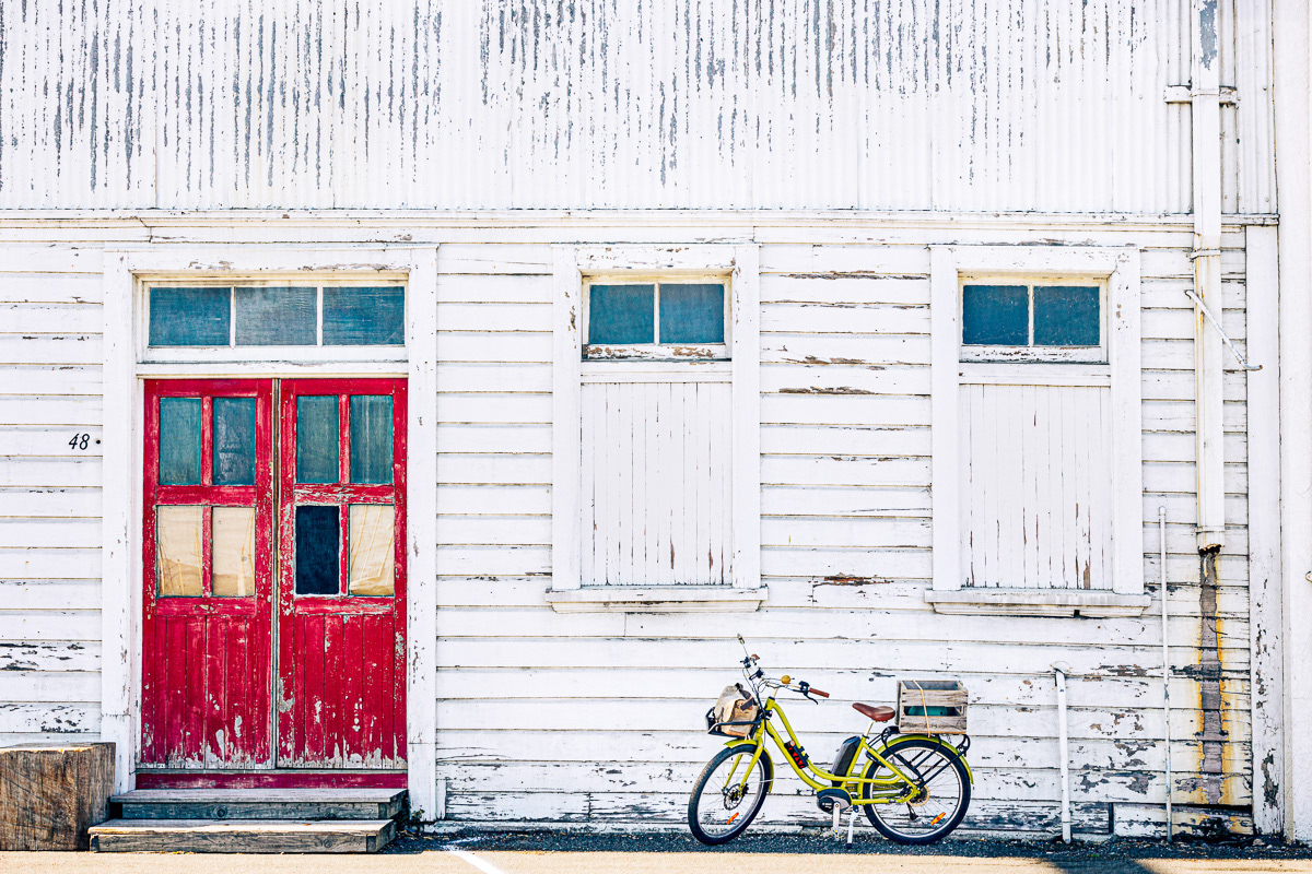 Two Windows & A Red Door
