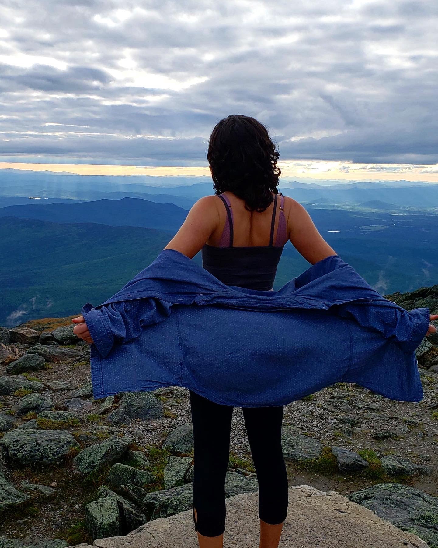 Basking in the sheer beauty of the landscape from the top of Mount. Washington.