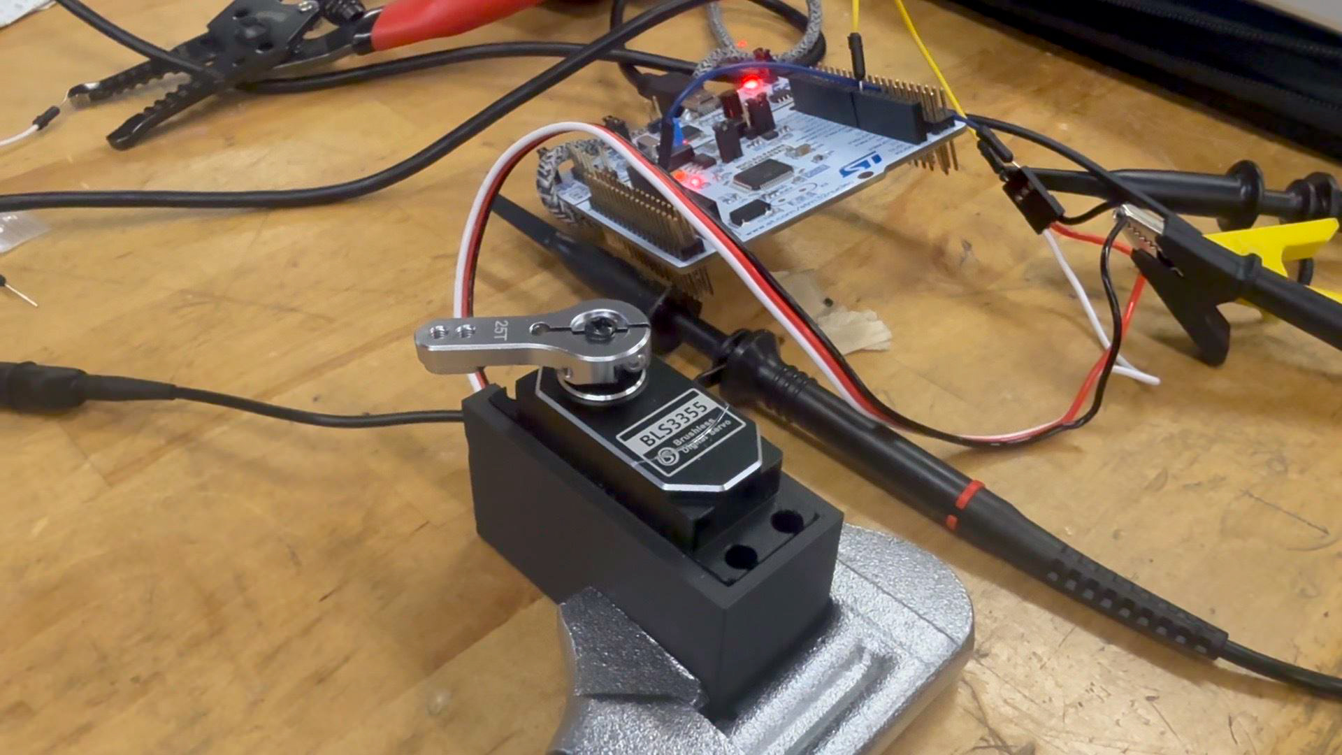 Quick testbed to measure maximum servo torque (Newton meter not pictured)