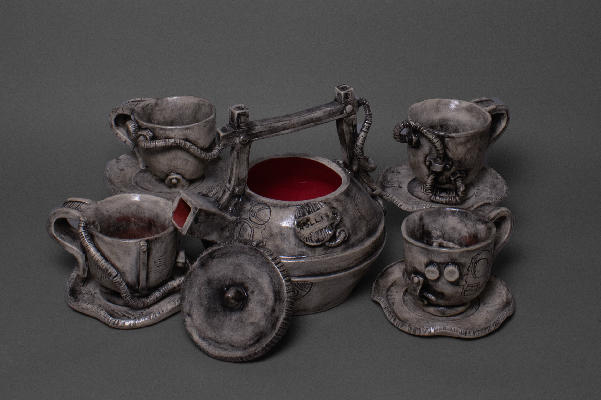 Pot: 8" x 7 1/2" x 8 11/16" saucers: 1/2" x 5 1/4" x 5 1/4" Cups: Approx. 3-3 1/2" x  3 1/4-3 7/8"  x  4 1/2-5 3/8" 