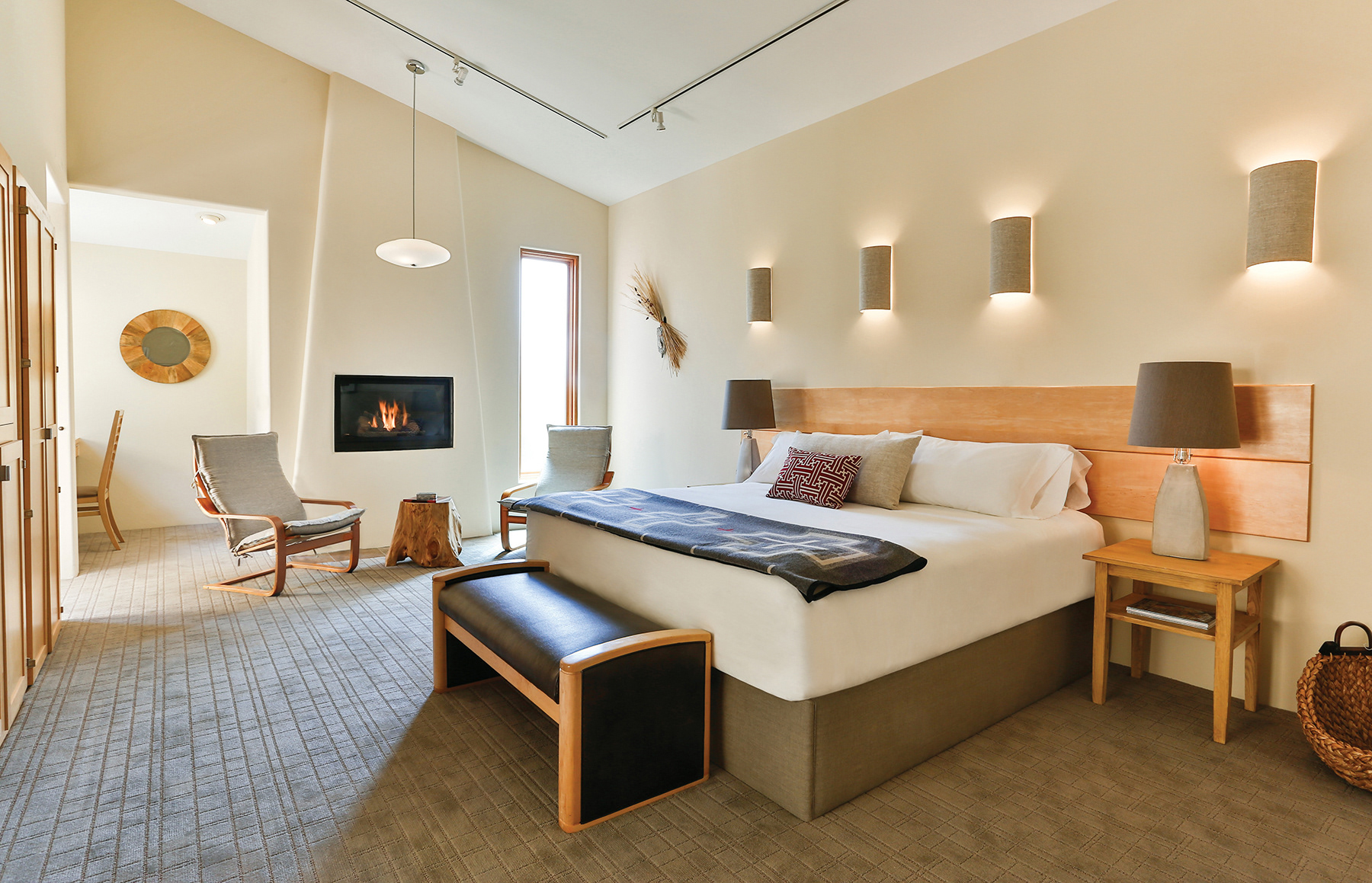 Contemporary suites are spacious and filled with natural light.