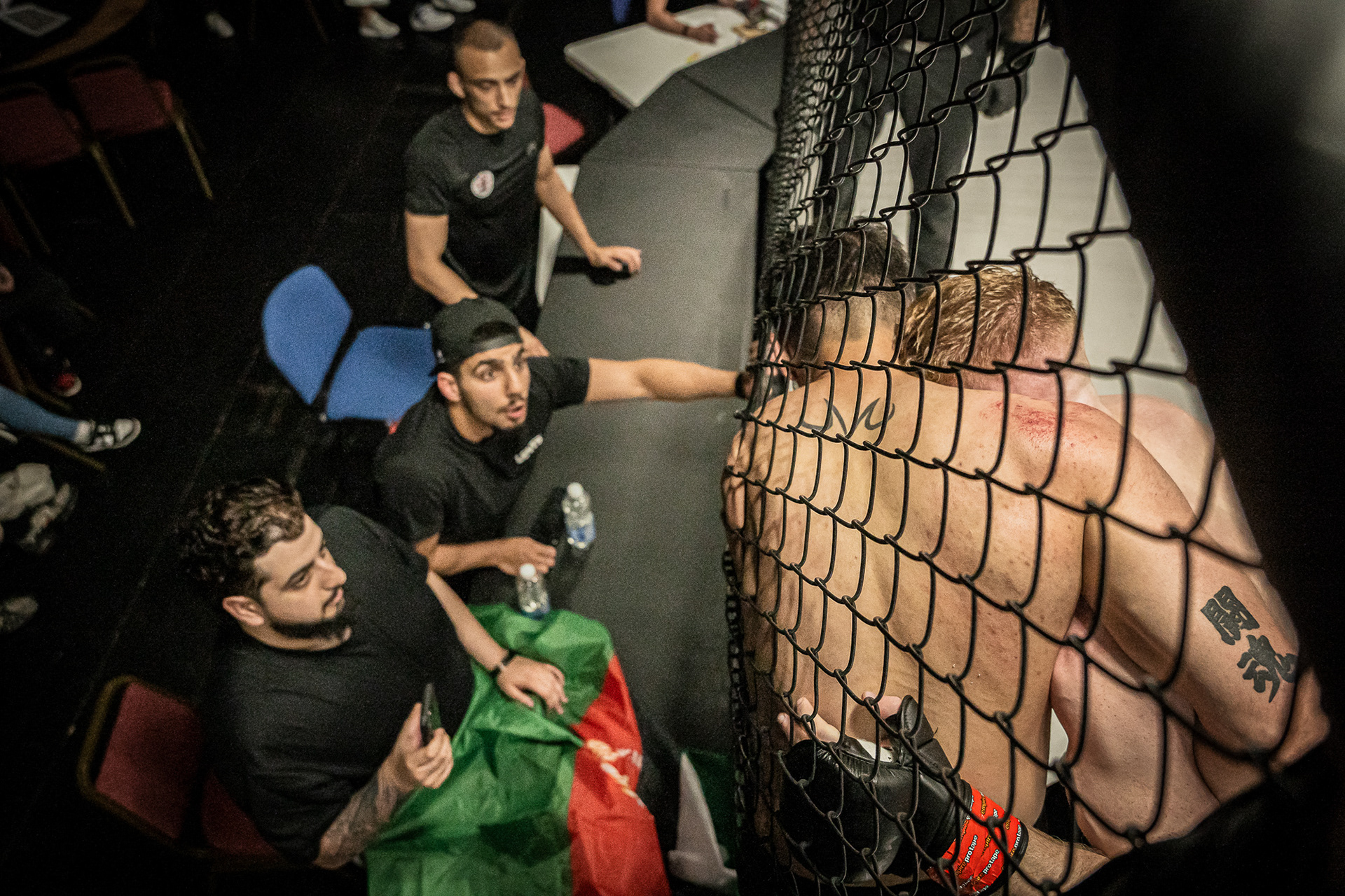 MMA Fight with corner men shot by a photographer