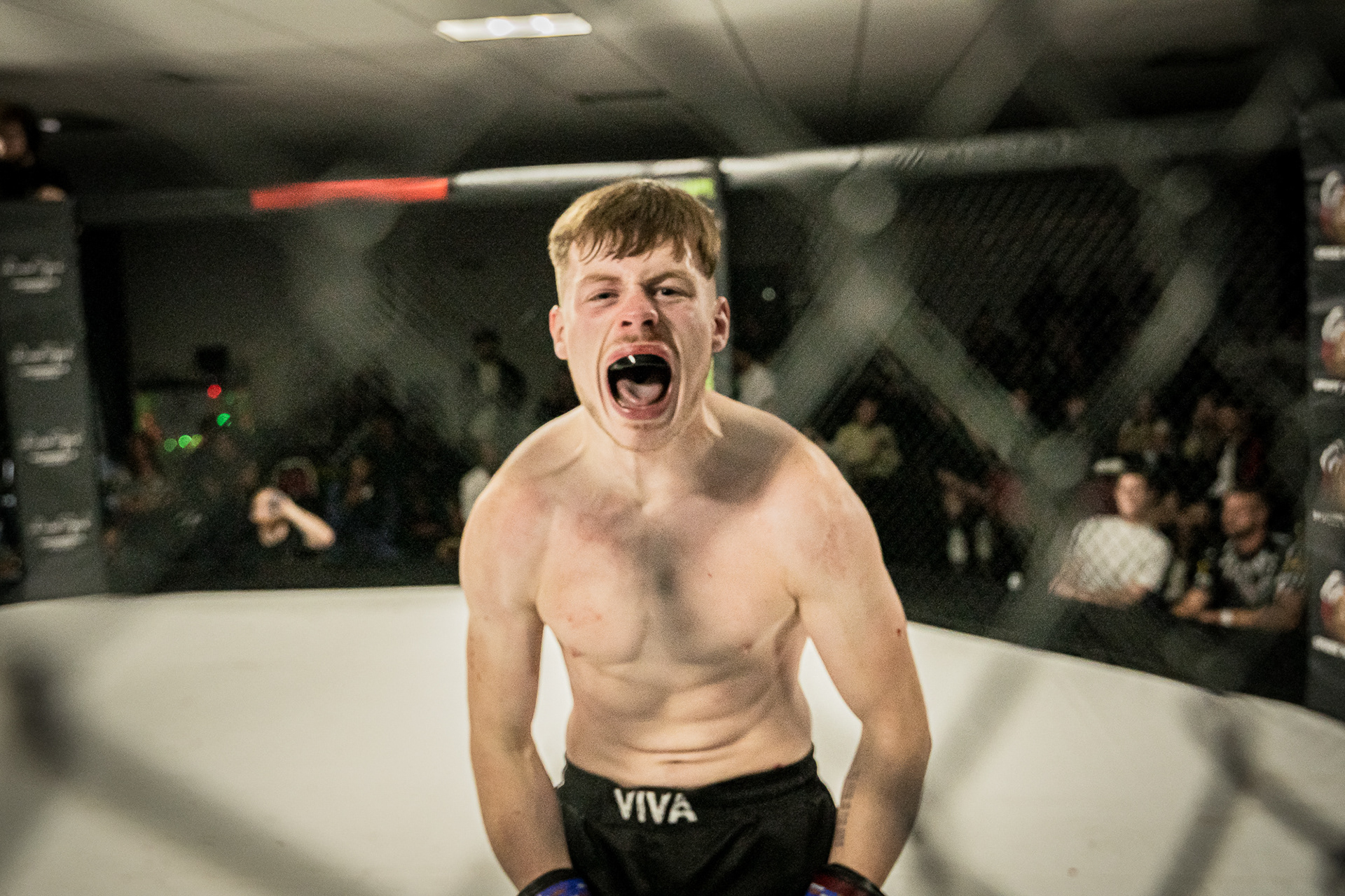 MMA fighter celebrates win with photography tips