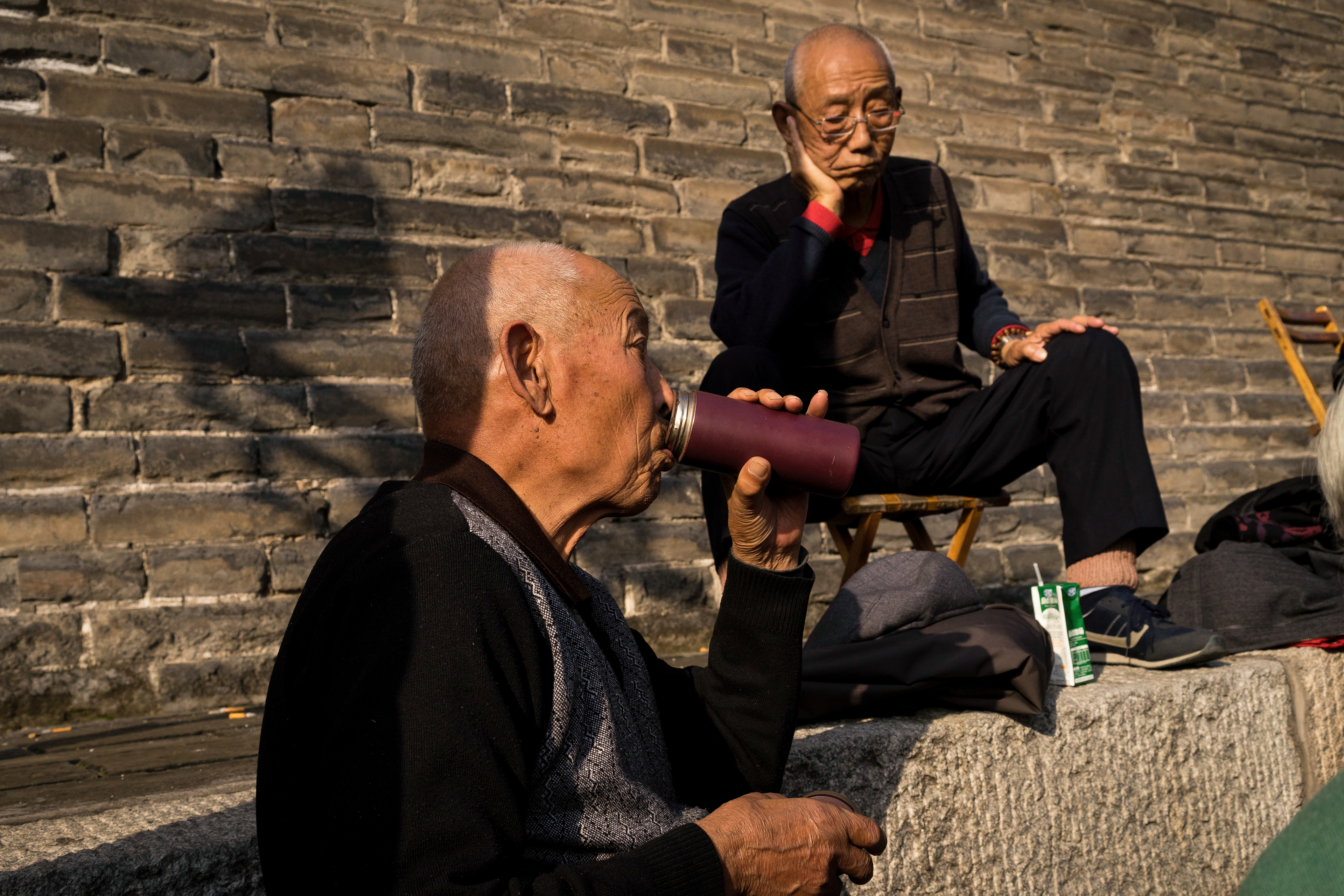 A couple good ol' boys enjoying the park on a warm afternoon. 