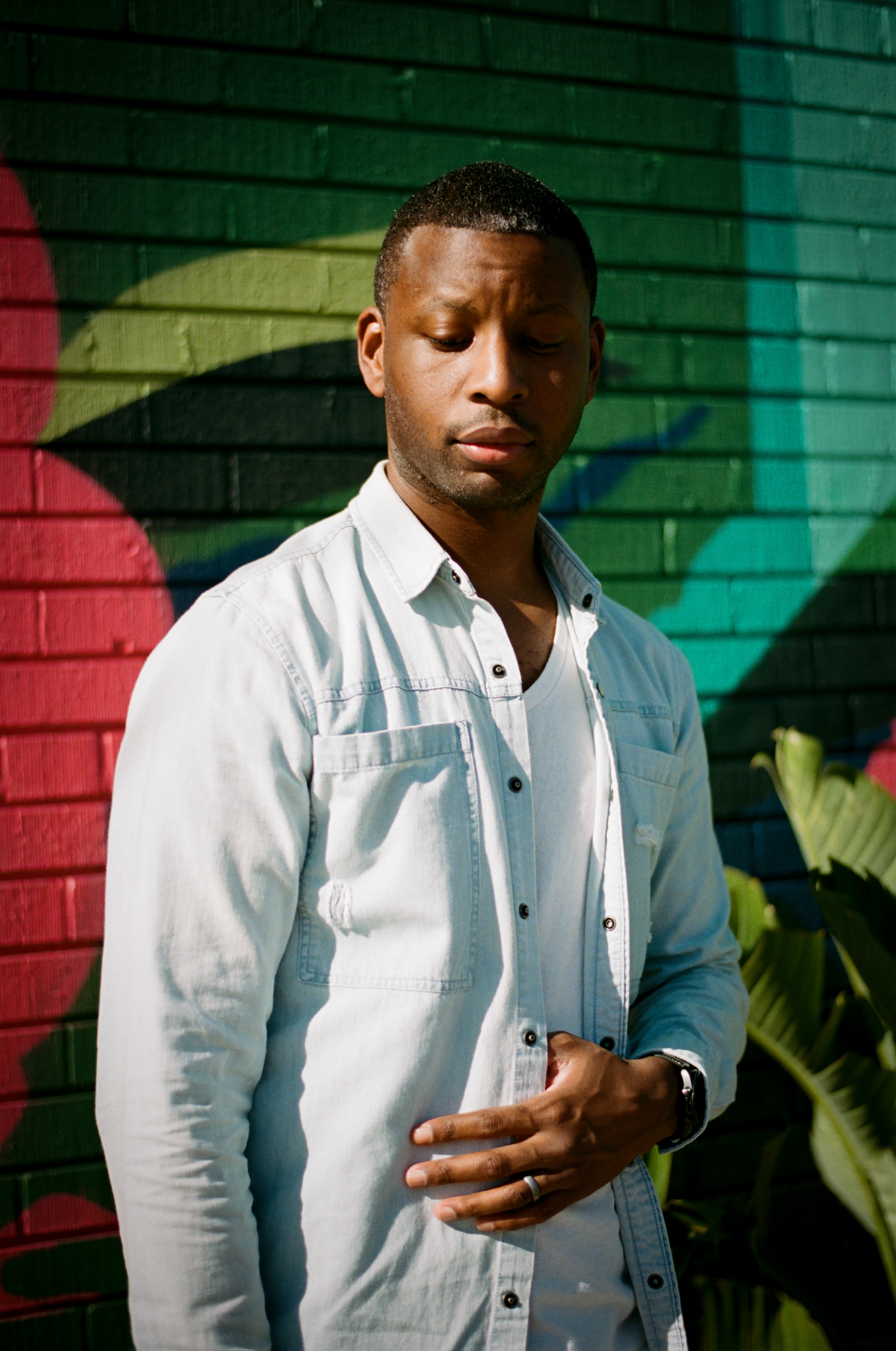 Nayo Portrait 1: Nayo, a brilliant salsa dancer, who along with his partner Kelly have built a vibrant salsa community hosting nights, teaching classes, and bringing a diverse group of talented dancers together. April 2022 - New Orleans - Photo by Aaron Guy Leroux