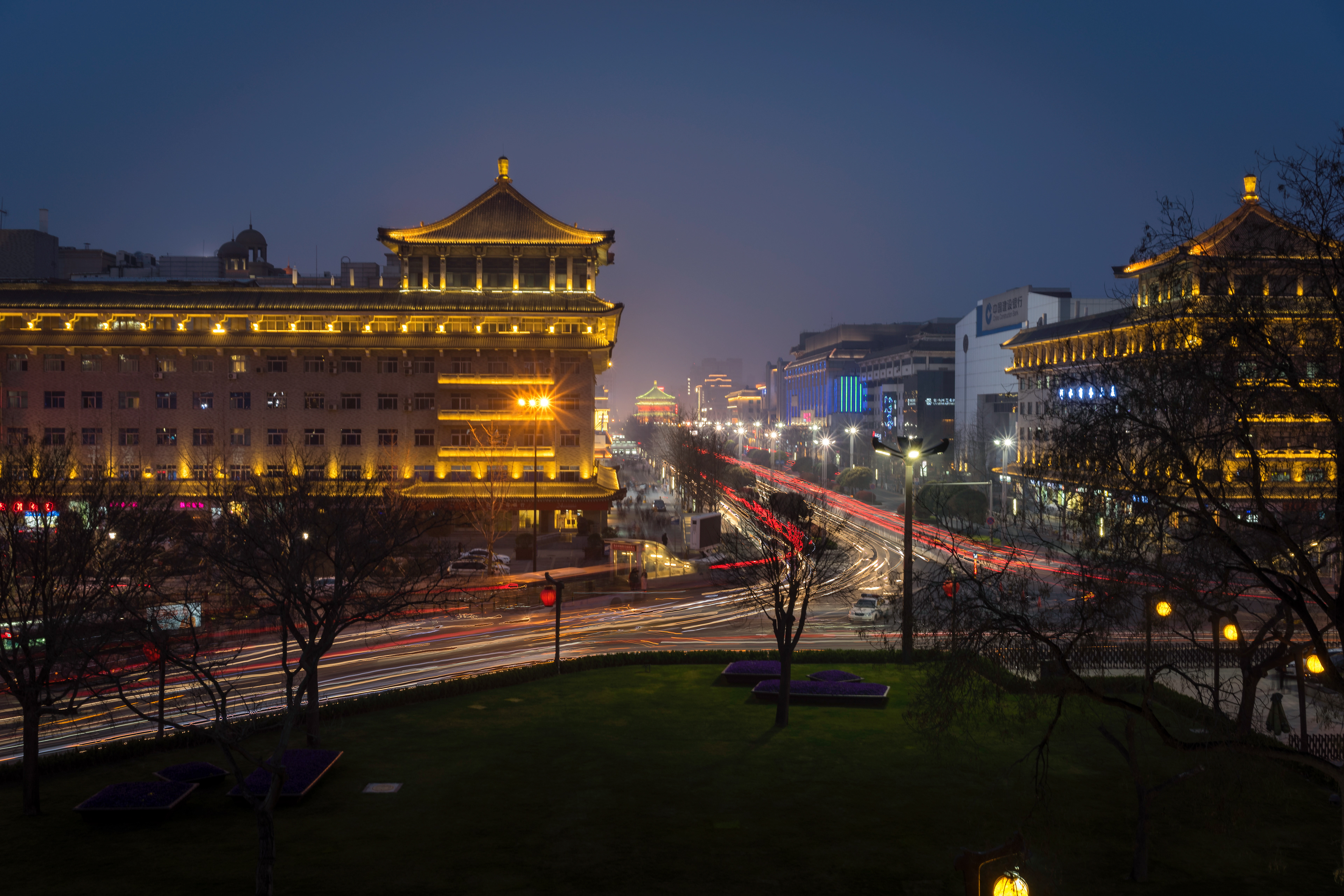 The center of the old city, Xi'an. 40 years ago this was dirt roads and bicycles. Now there is a Louis Vuitton and a Dairy Queen.
