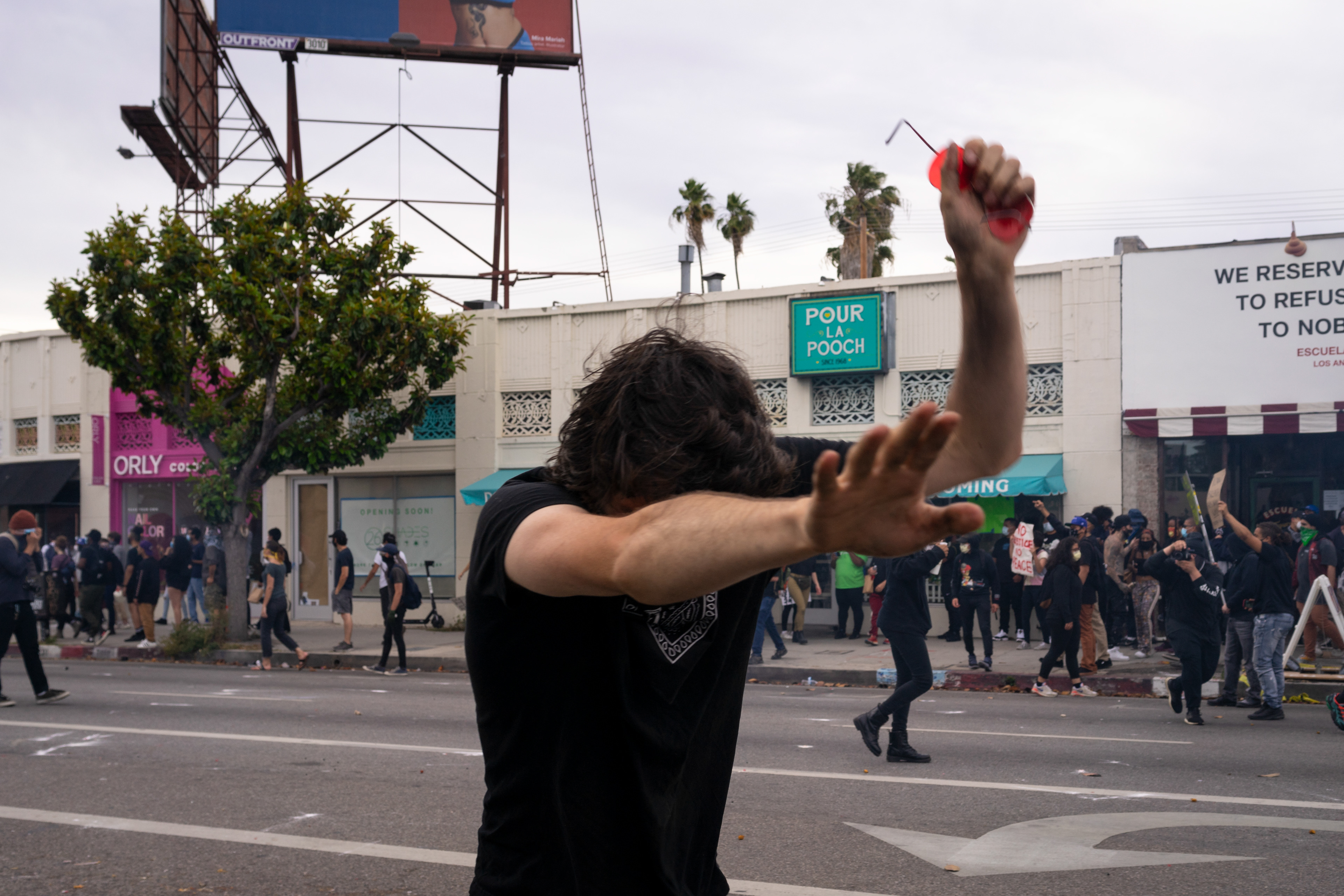 Who's There: Fairfax, Los Angeles: A young man gropes blindly as he stumbles down Beverly Blvd after being tear-gassed. He cries out "Who's there?" and "I Can't See!" Angelinos took to the streets to protest continued police violence and murder in the wake of George Floyd's murder by Minnesota Police on May 25th. May 30, 2020-Los Angeles-Photo by Aaron Guy Leroux/ Sipa USA
