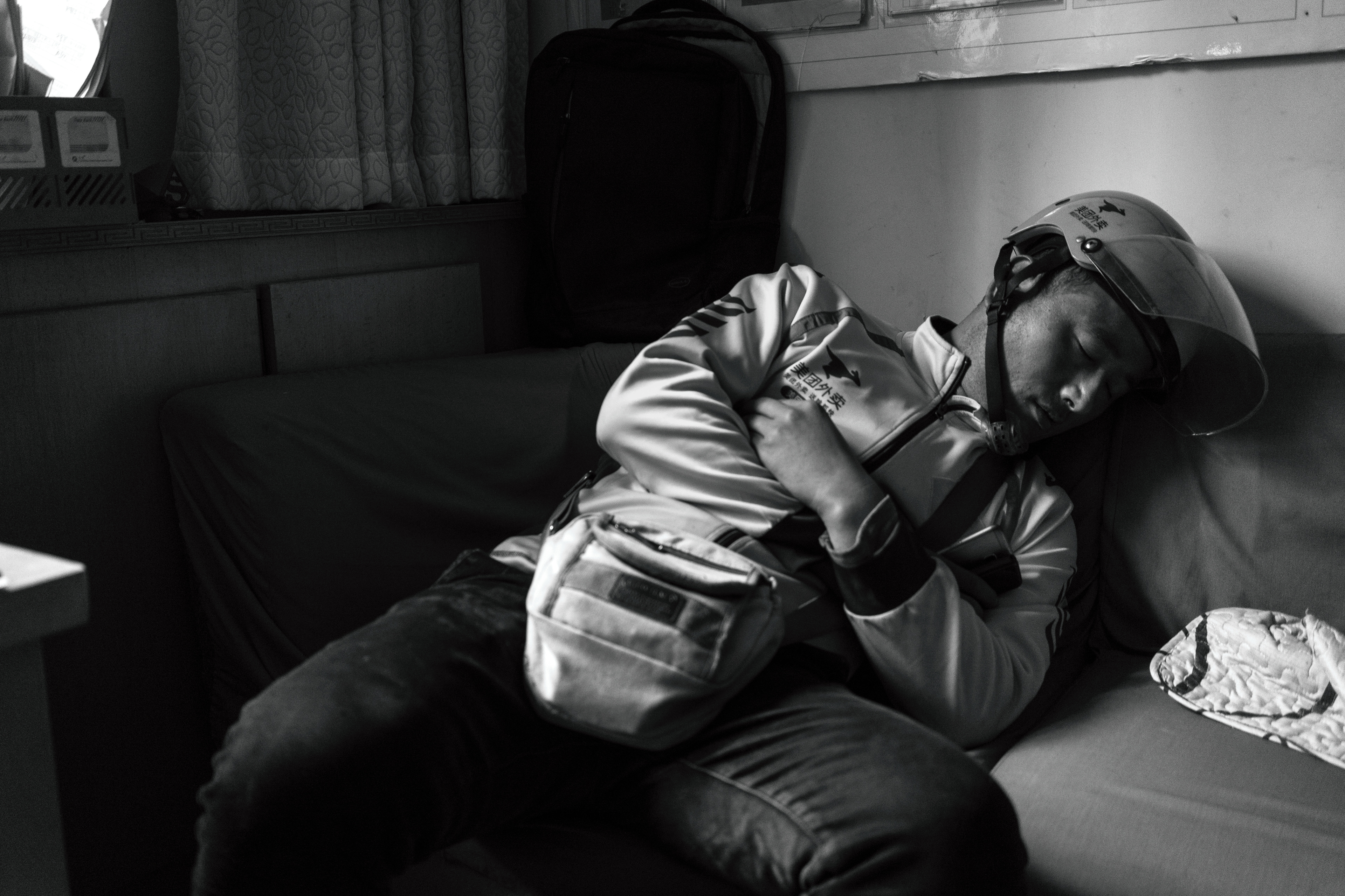 Nap time for a delivery driver in Xi'an, China