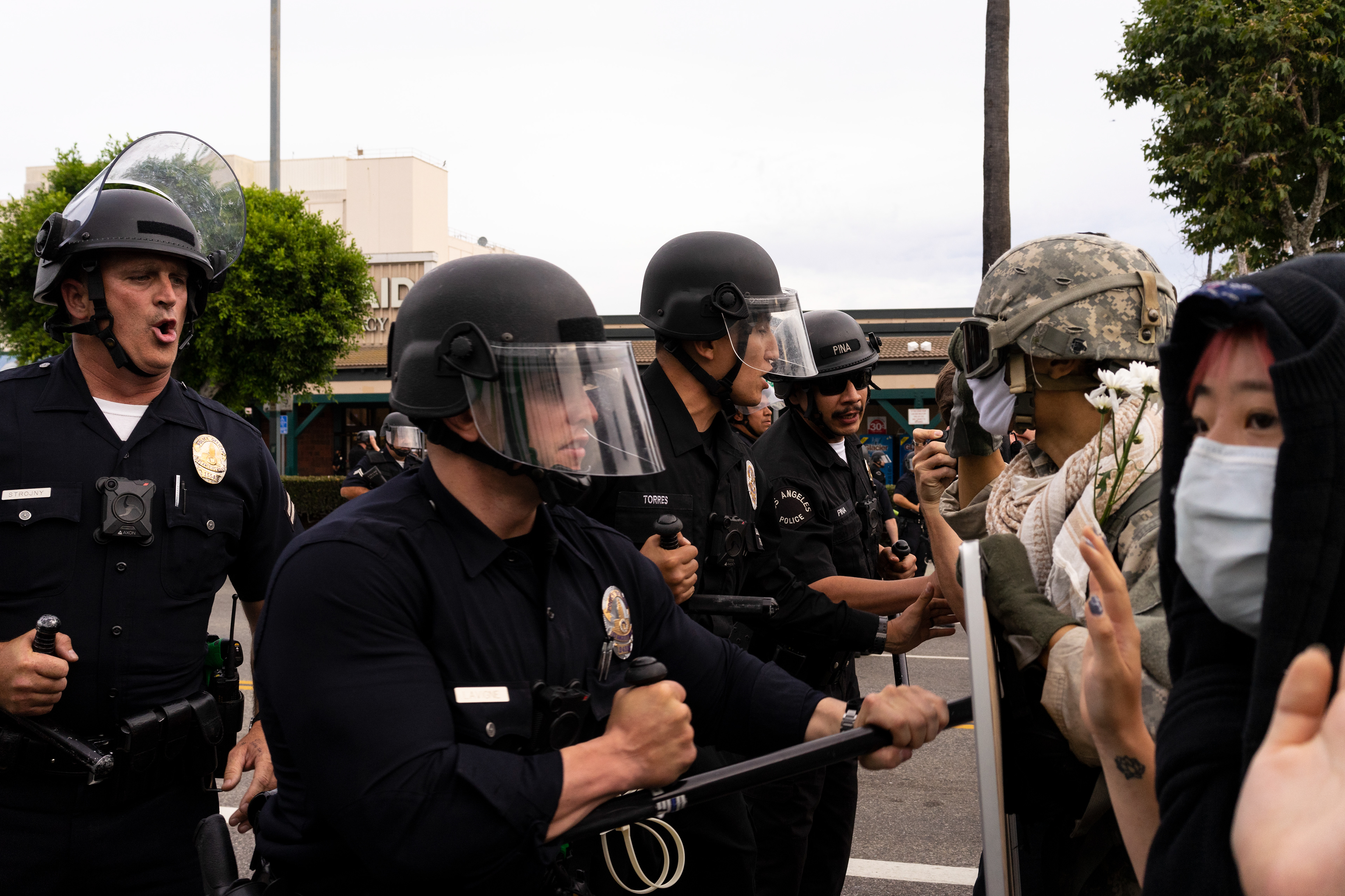 Pushing and Shoving: Hollywood - At the intersection of Sunset & Vine, LAPD officers attempt to drive back a small group of protestors. Angelinos took to the streets for a third day to protest continued police violence and murder in the wake of George Floyd's murder by Minnesota Police on May 25th. June 1, 2020-Los Angeles-Photo by Aaron Guy Leroux/ Sipa USA