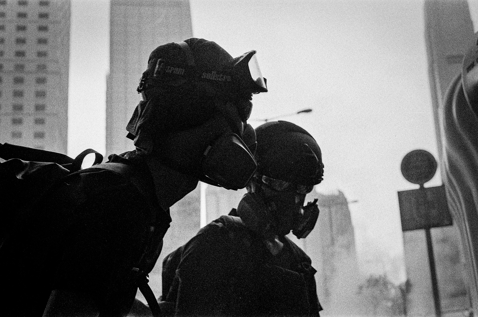 Front Lines: Admiralty, Hong Kong: Front line protestors waste no time assaulting police headquarters with petrol bombs and bricks. It takes seconds for the streets to be enveloped in a fog of tear gas. Sunday marked a return to violence for both police and citizens alike after three days of peaceful demonstrations due to the anniversary of 9/11 and the autumn moon festival. September 15, 2019-Hong Kong, 35mm