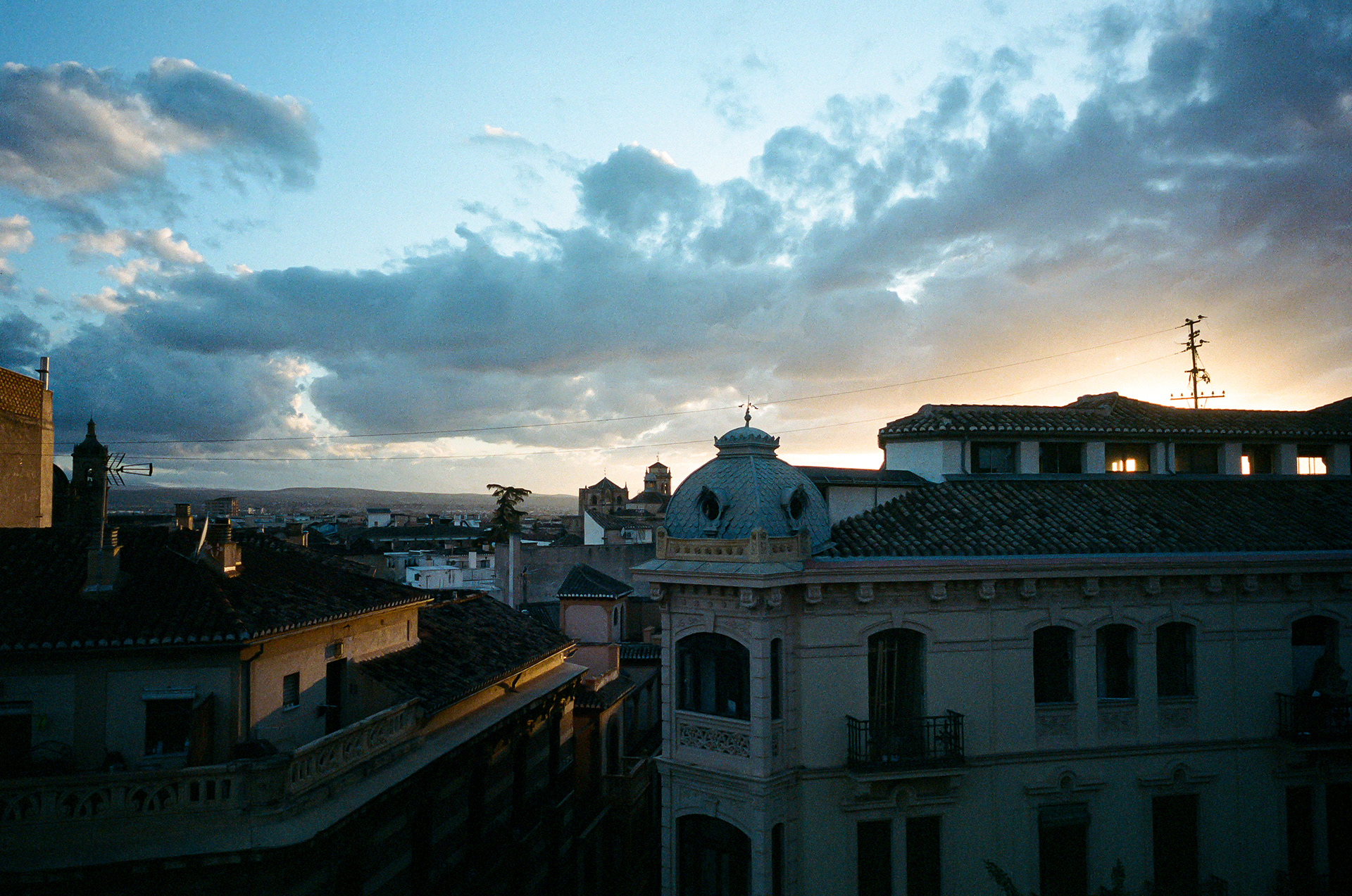 Granada - Back in Granada. Having completed the GR7 through Andalusia I was forced to hitch a ride back to Granada before continuing on through spain. Pueblo de don Fedrique, the town at the end of the GR7, was a vortex. There was no transportation out of the town aside from a ride sharing app. I ened up hitching a ride with Jesus in his grey BMW and the Spanish landscape that it took me over a week to walk, rocketed by in just 90minutes. From Granada, I hitched a bus south to Murcia where I continued my trek on the EV8 cycling path. Photo by - Aaron Guy Leroux - April, 2024 - Granada, Spain
