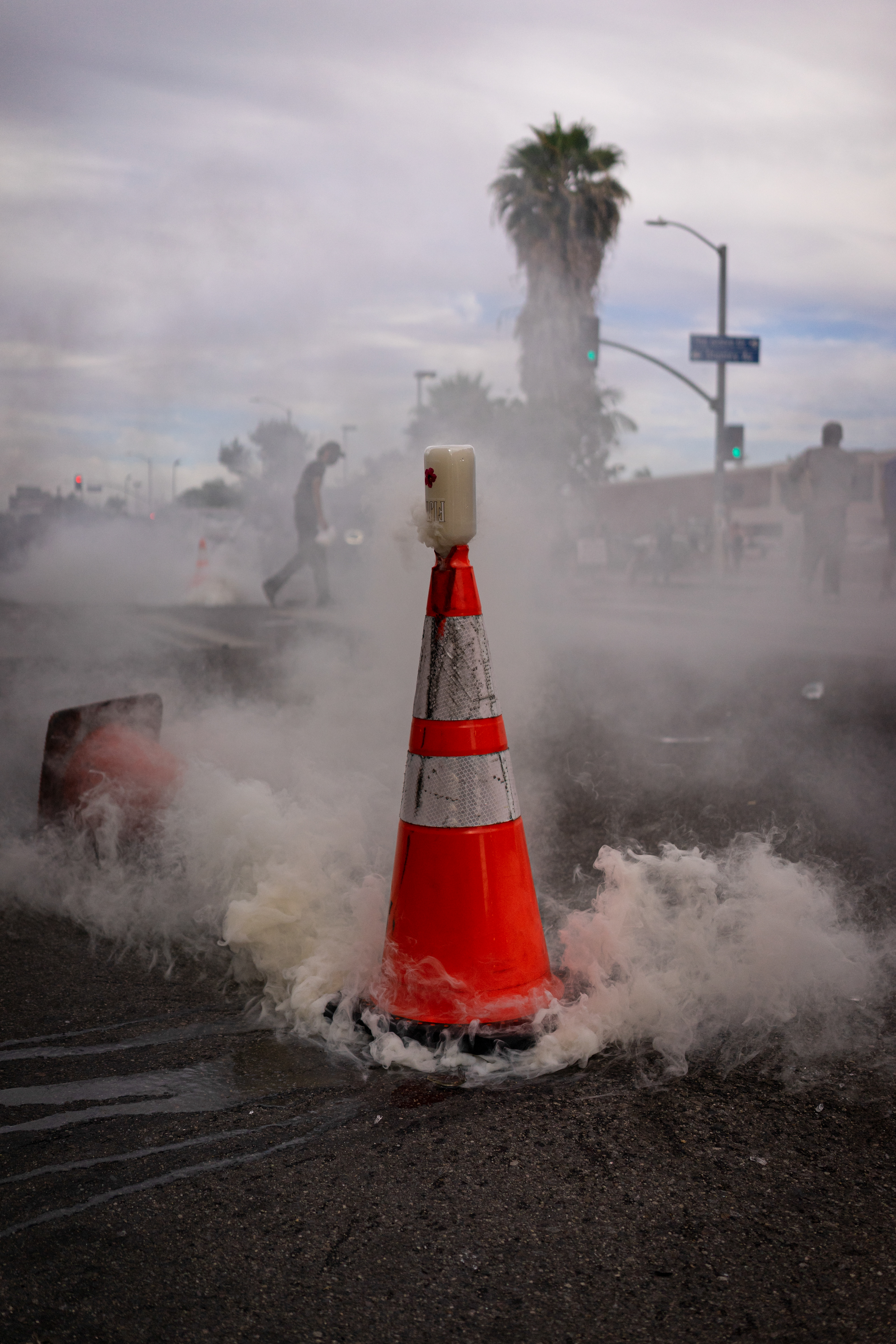 Cone: Fairfax, Los Angeles - Tear gas burns in the streets of America once again Angelinos took to the streets to protest continued police violence and murder in the wake of George Floyd's murder by Minnesota Police on May 25th. May 30, 2020-Los Angeles-Photo by Aaron Guy Leroux/ Sipa USA