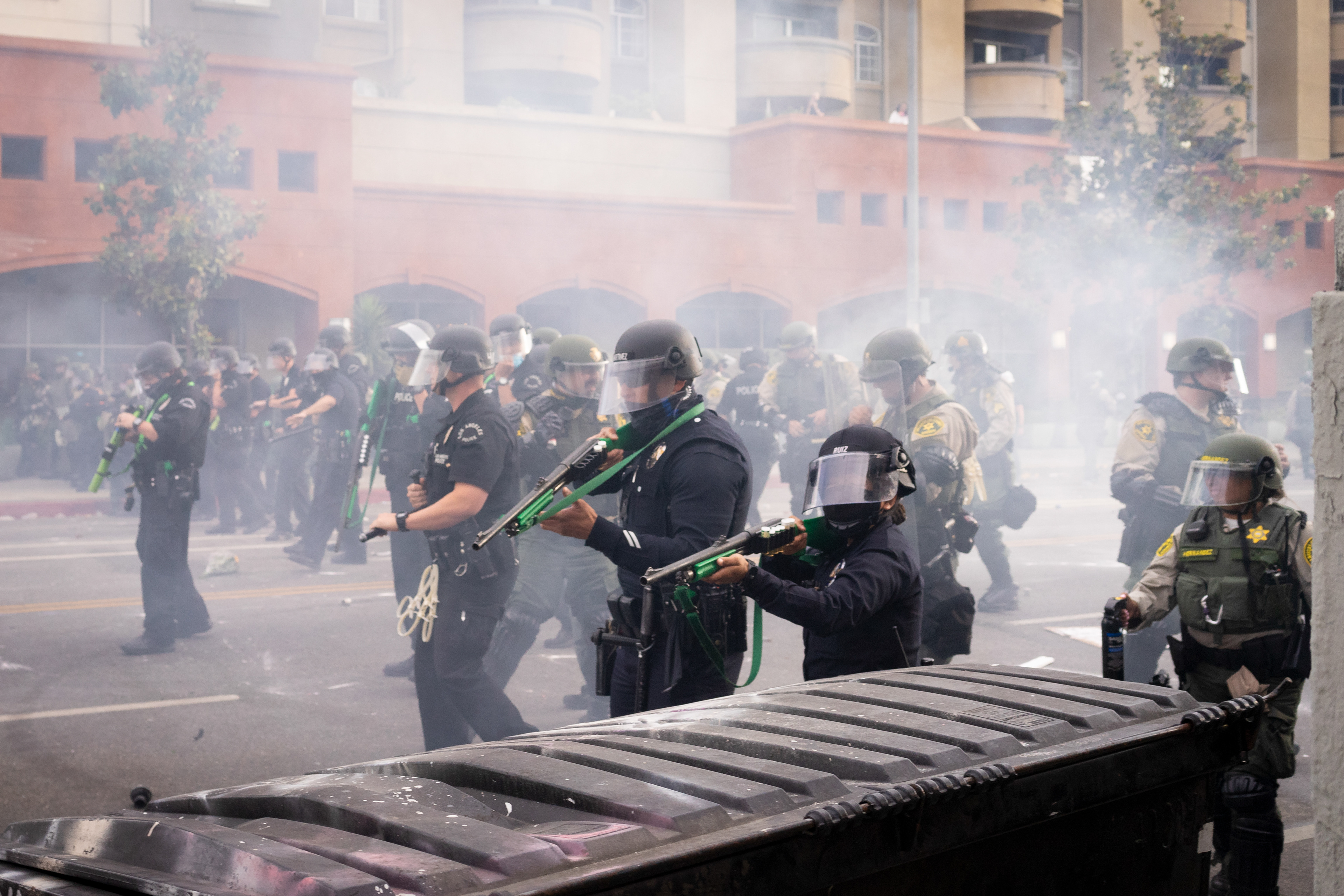 On the Move: Fairfax, Los Angeles - LAPD, backed by riot police from the Sheriff's Department, advance East along Beverly Blvd firing sponge rounds, pepper balls, as well as tear gas and tear gas grenades. Angelinos took to the streets to protest continued police violence and murder in the wake of George Floyd's murder by Minnesota Police on May 25th. May 30, 2020-Los Angeles-Photo by Aaron Guy Leroux/ Sipa USA