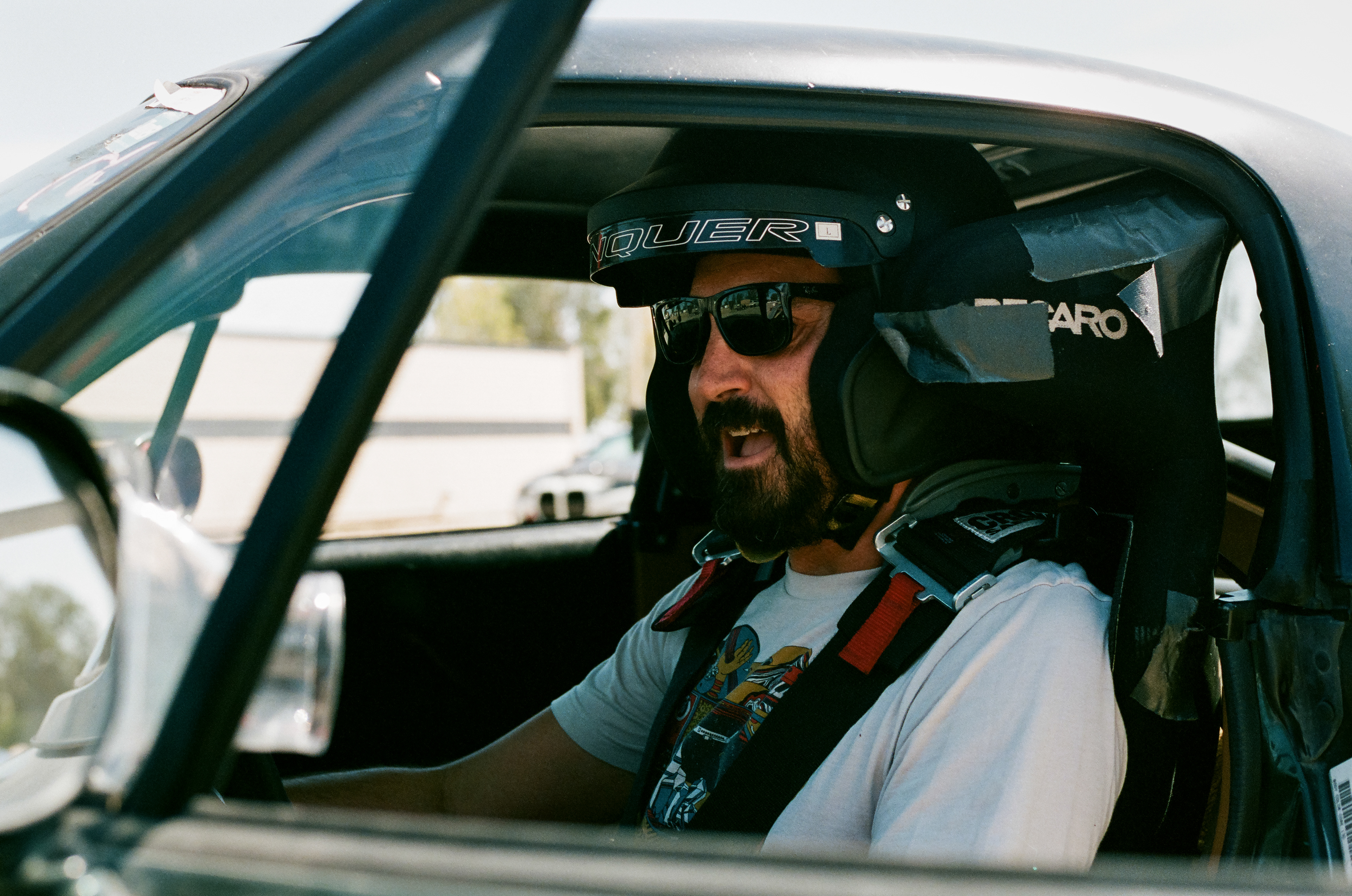 Fire It Up: Cy lets out a hoot of excitment as Kermit fires to life for the first session of the day. Cyrus Legg spends the day practicing his performance driving skills in his Mazda Miata, named Kermit, at Button Willow Raceway Park  July 29, 2023 - Buttonwillow, CA - Photo by Aaron Guy Leroux