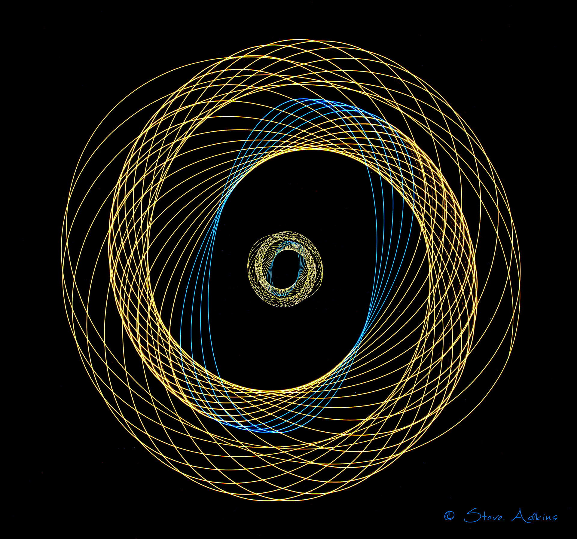 Created with images of physiograms. A long exposeure of the path of a swinging light.