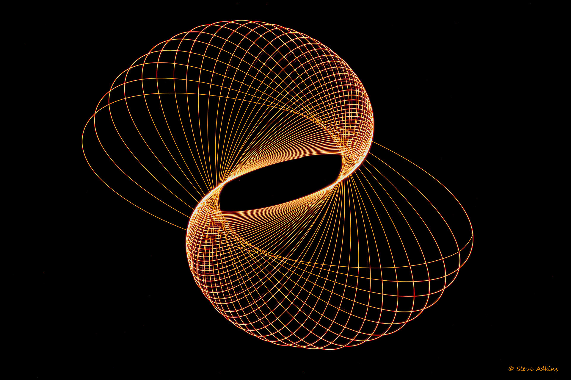 Created with images of physiograms. A long exposeure of the path of a swinging light.