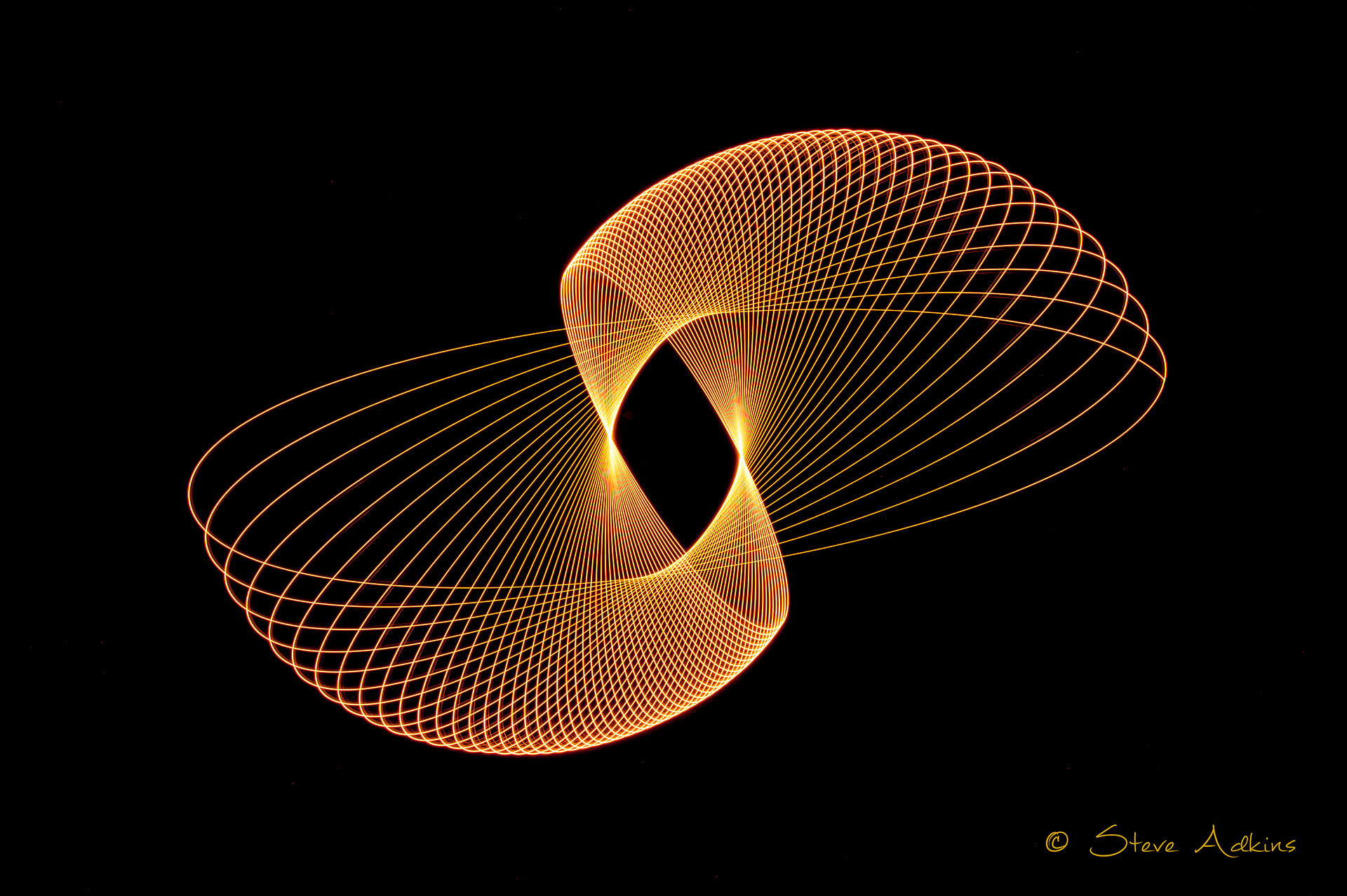 Created with images of physiograms. A long exposeure of the path of a swinging light.