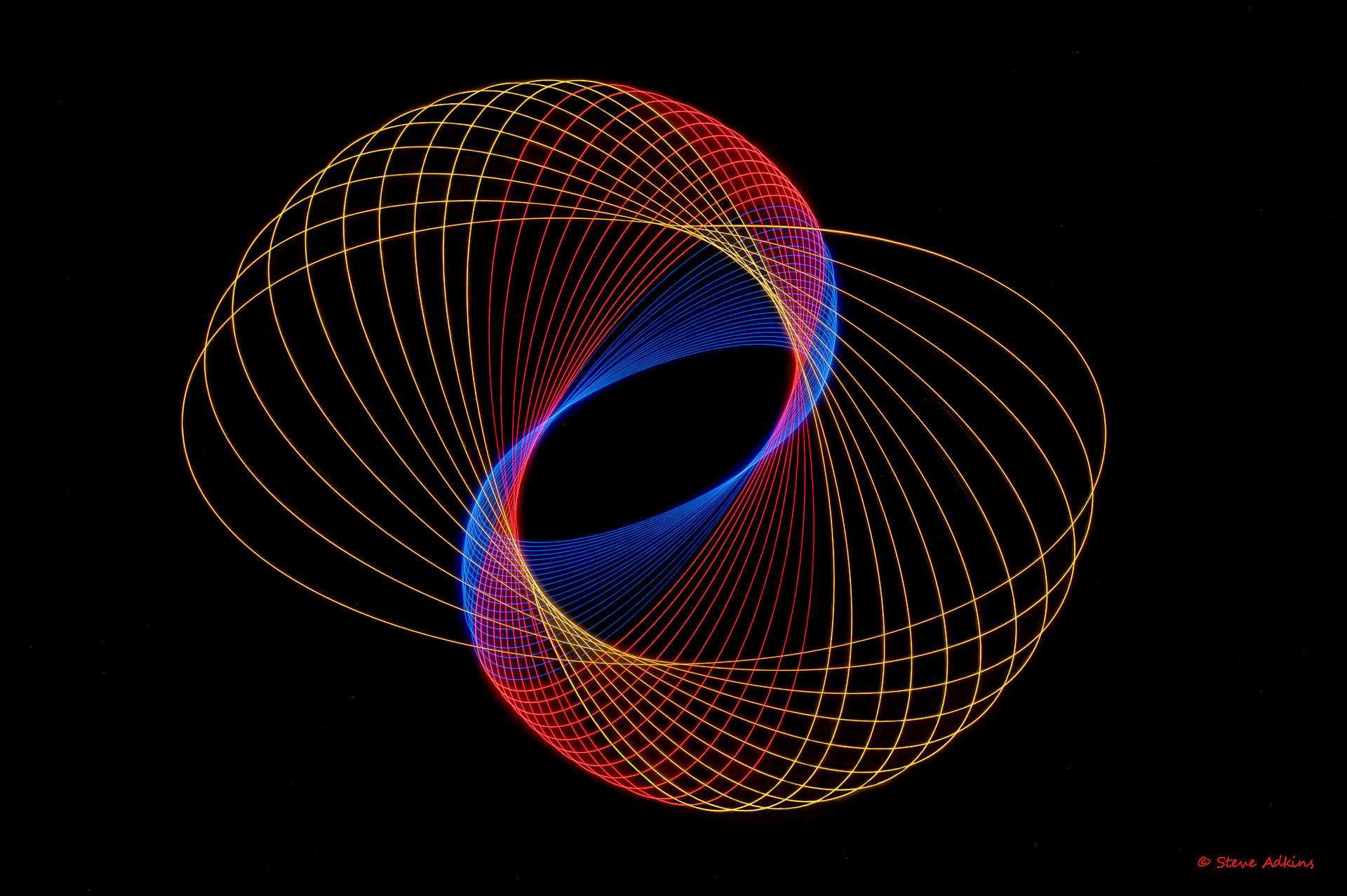 Created with images of physiograms. A long exposeure of the path of a swinging light.