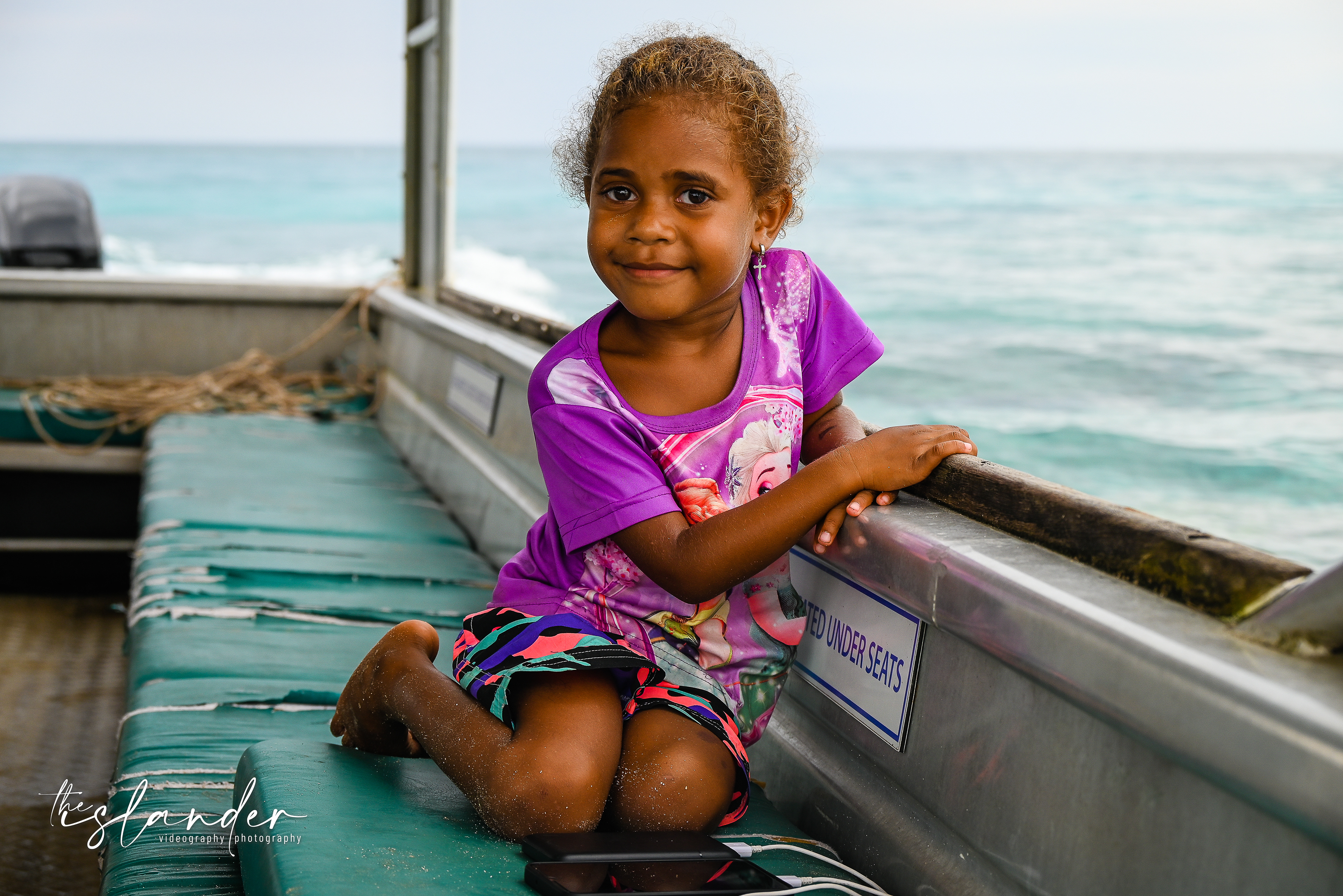 Smiling girl enjoying the boat ride