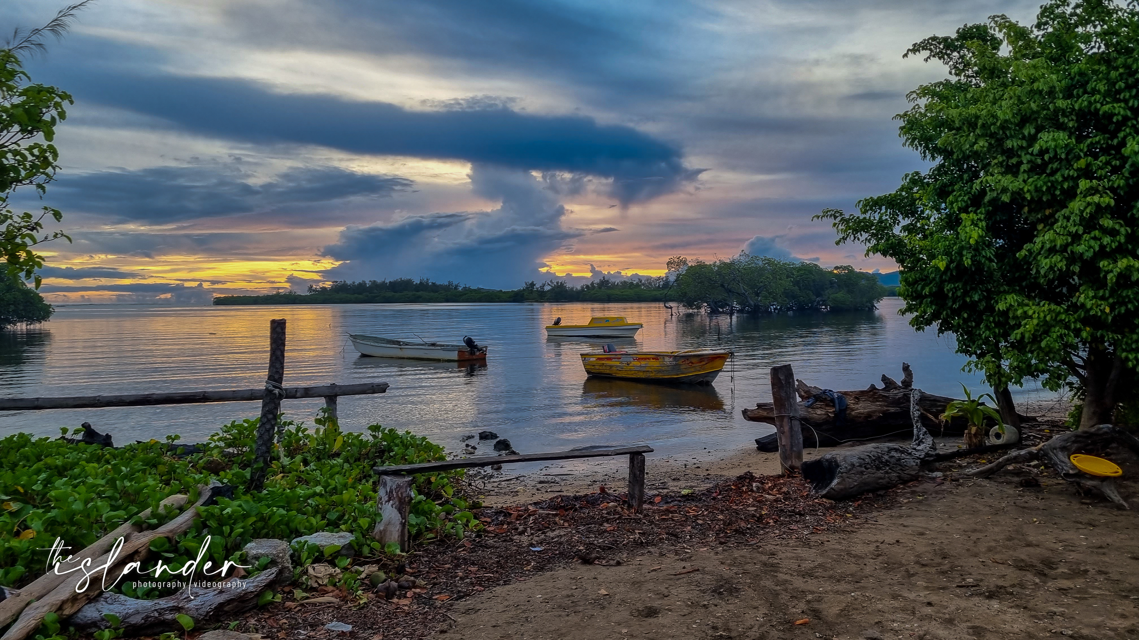 Sunset view of the nakamal on water