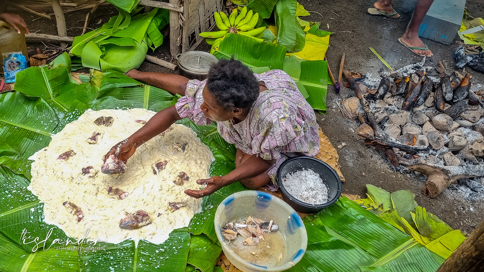 Carole preparing the laplap that her husband Robert caught