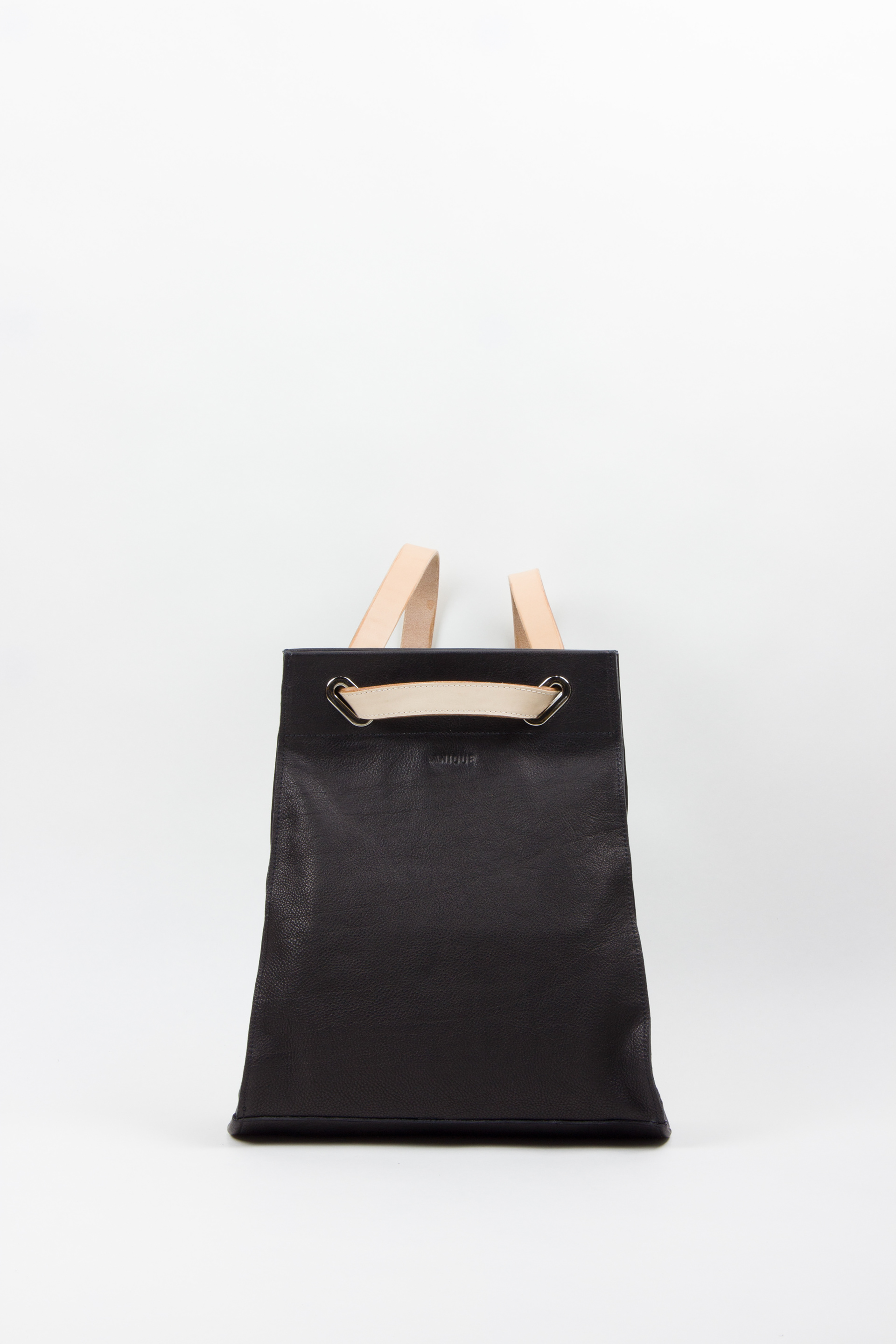 backpack black veg tan leather
