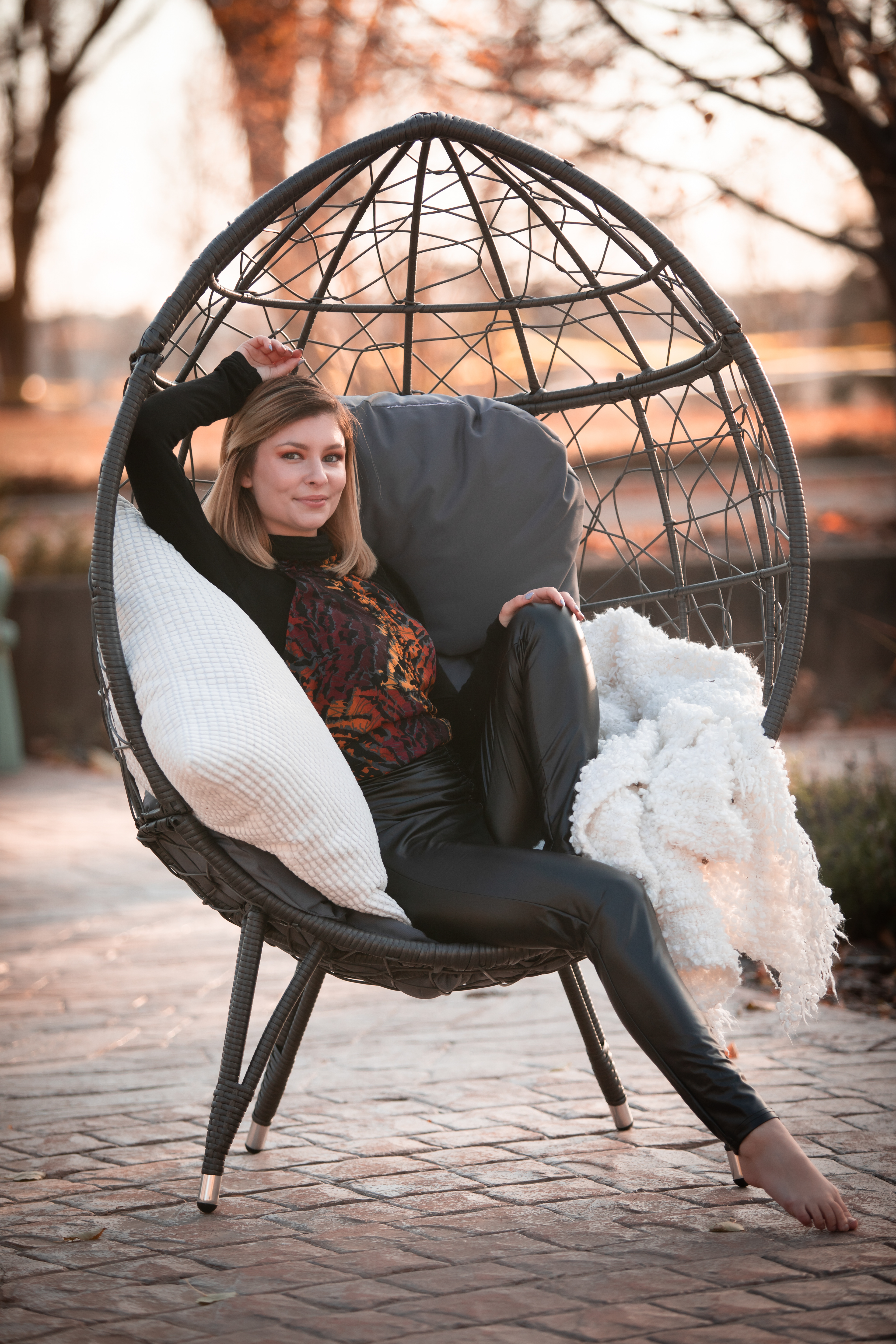 girl in an egg chair 