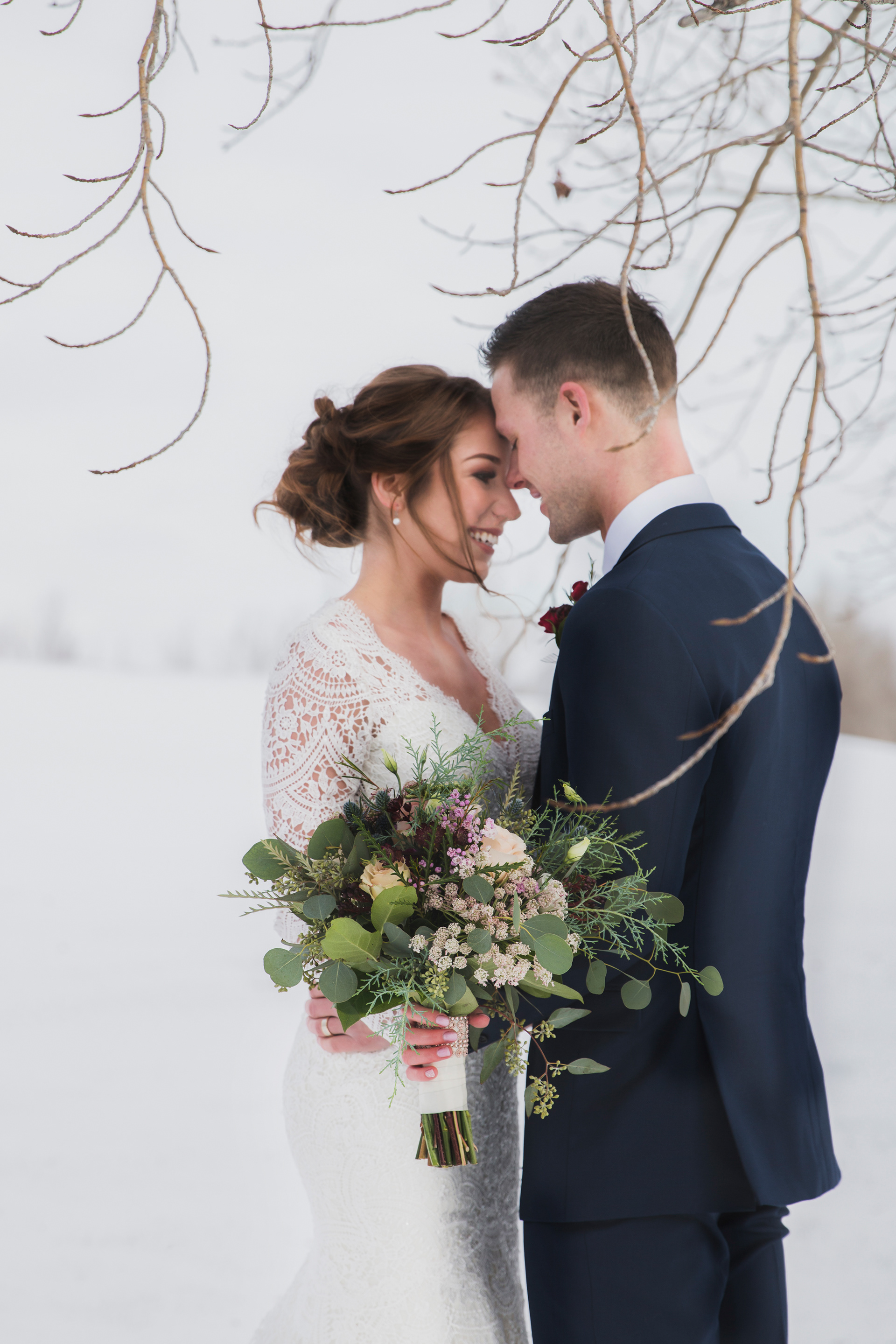Bride and groom in the winter in Edmonton