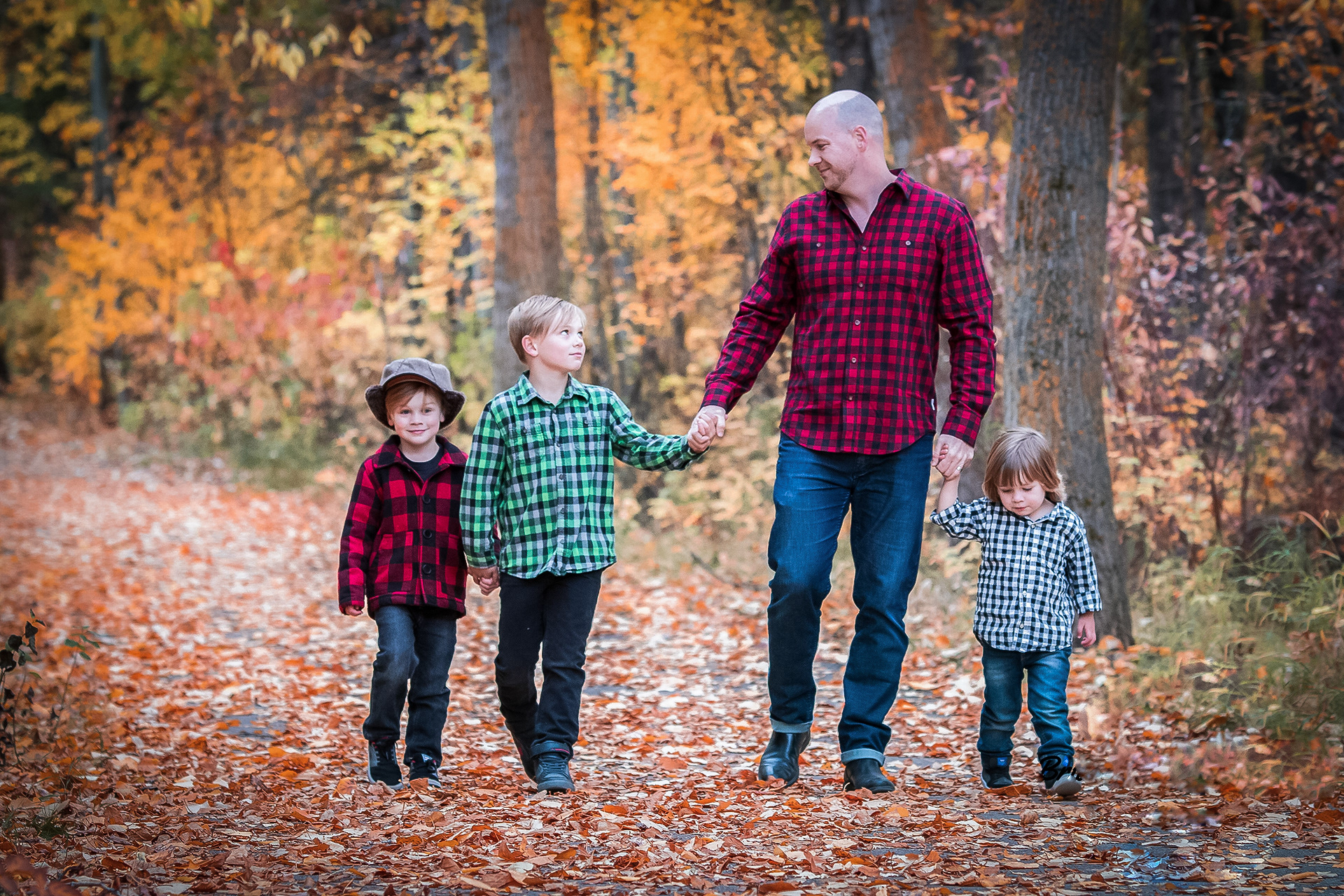 Dad and sons walking