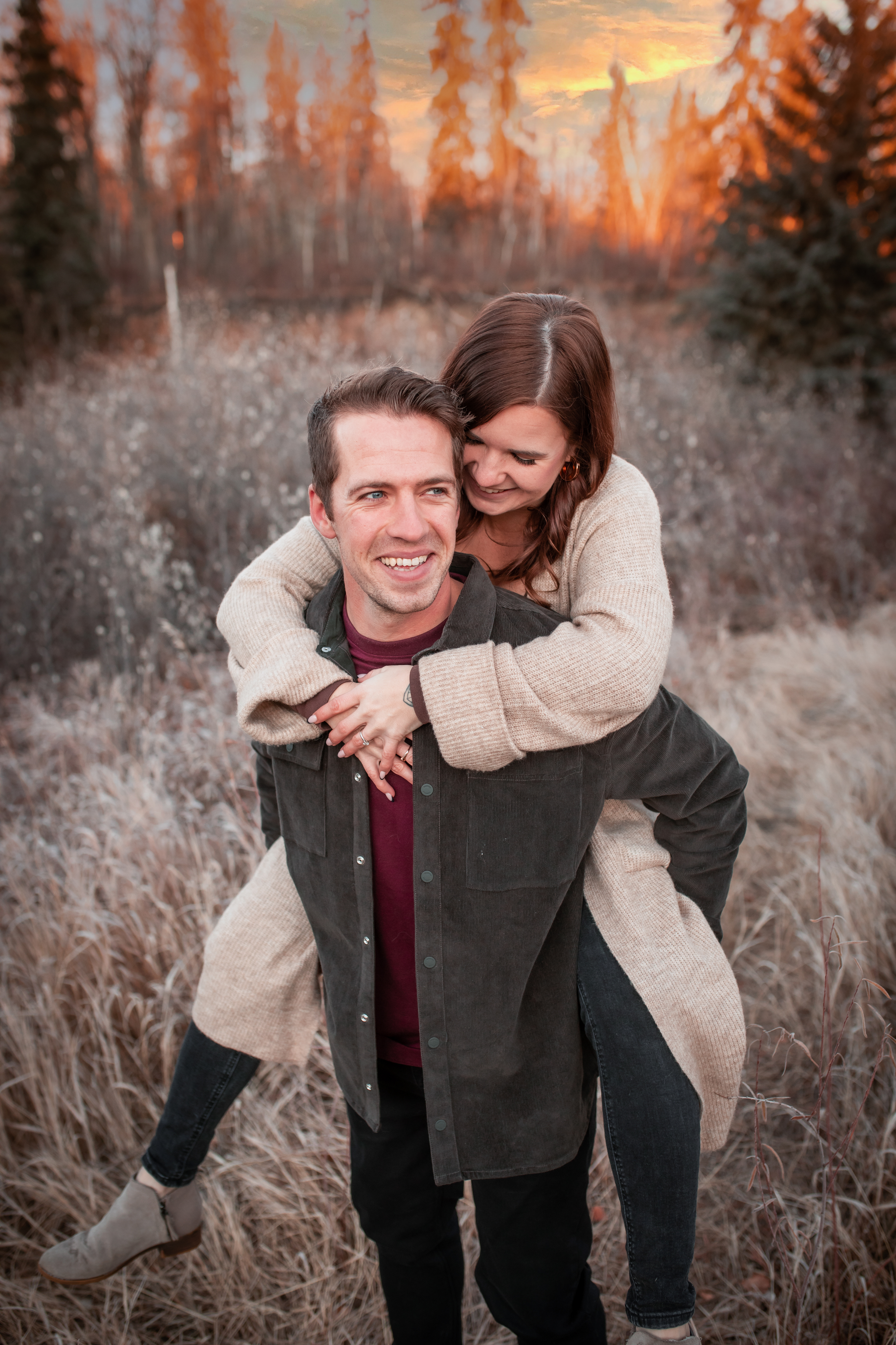 boyfriend giving girl a piggy back in edmonton
