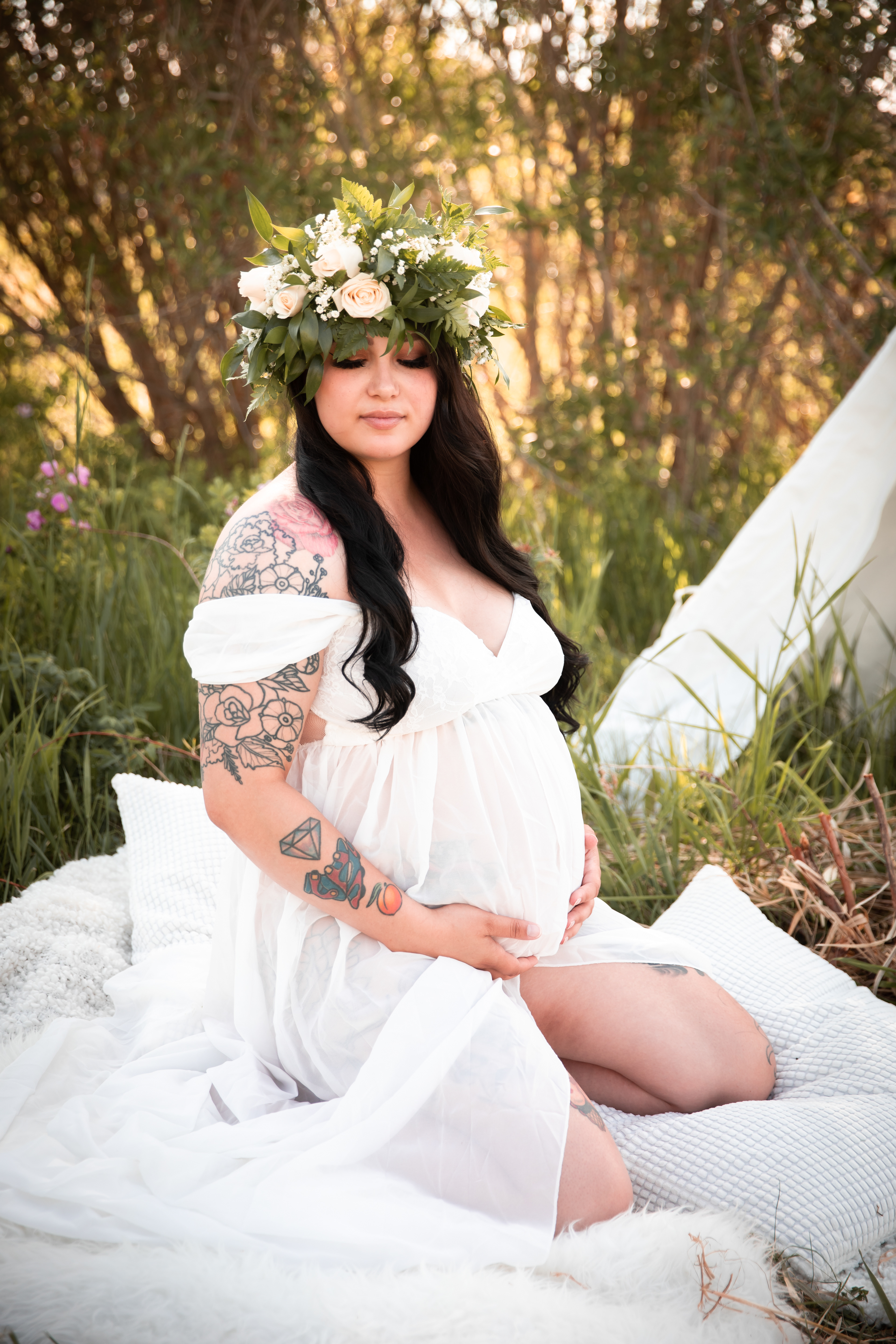 mom to be holding her belly