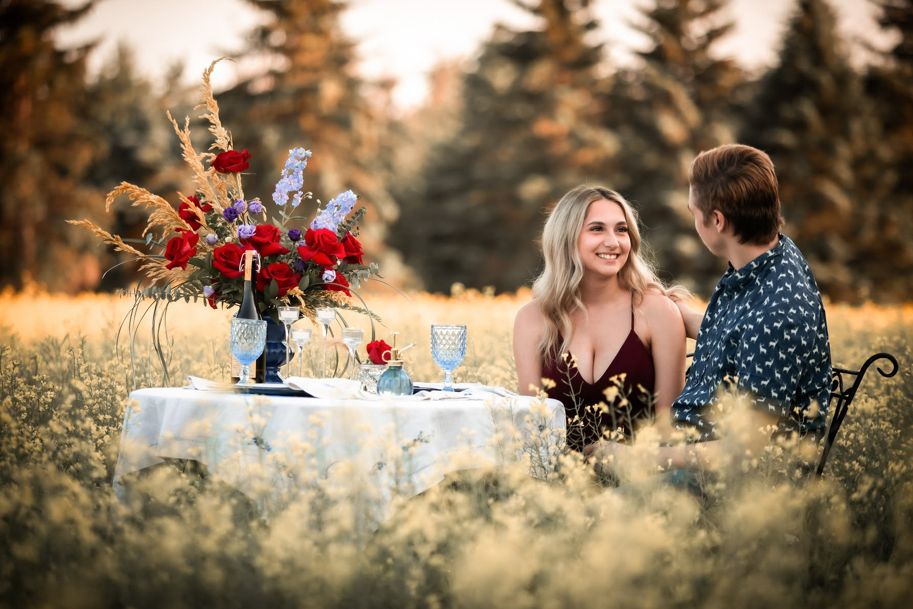 couple smiling at the table 