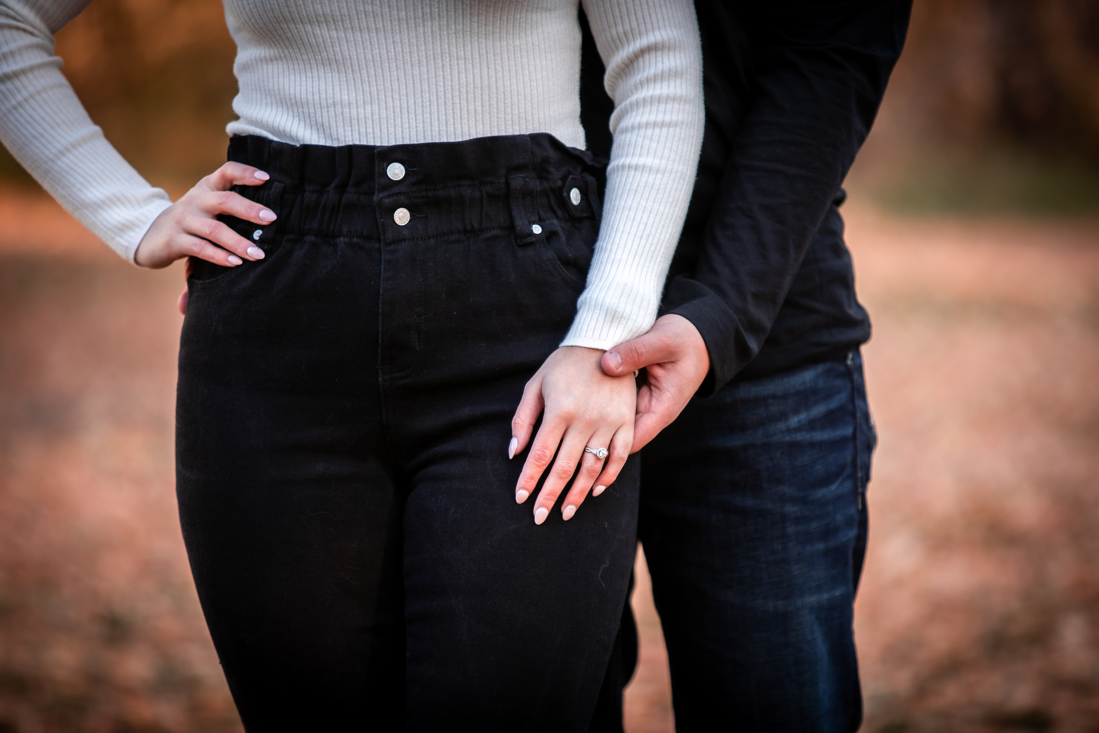 couple showing off her ring. Edmontons best engagement photographer