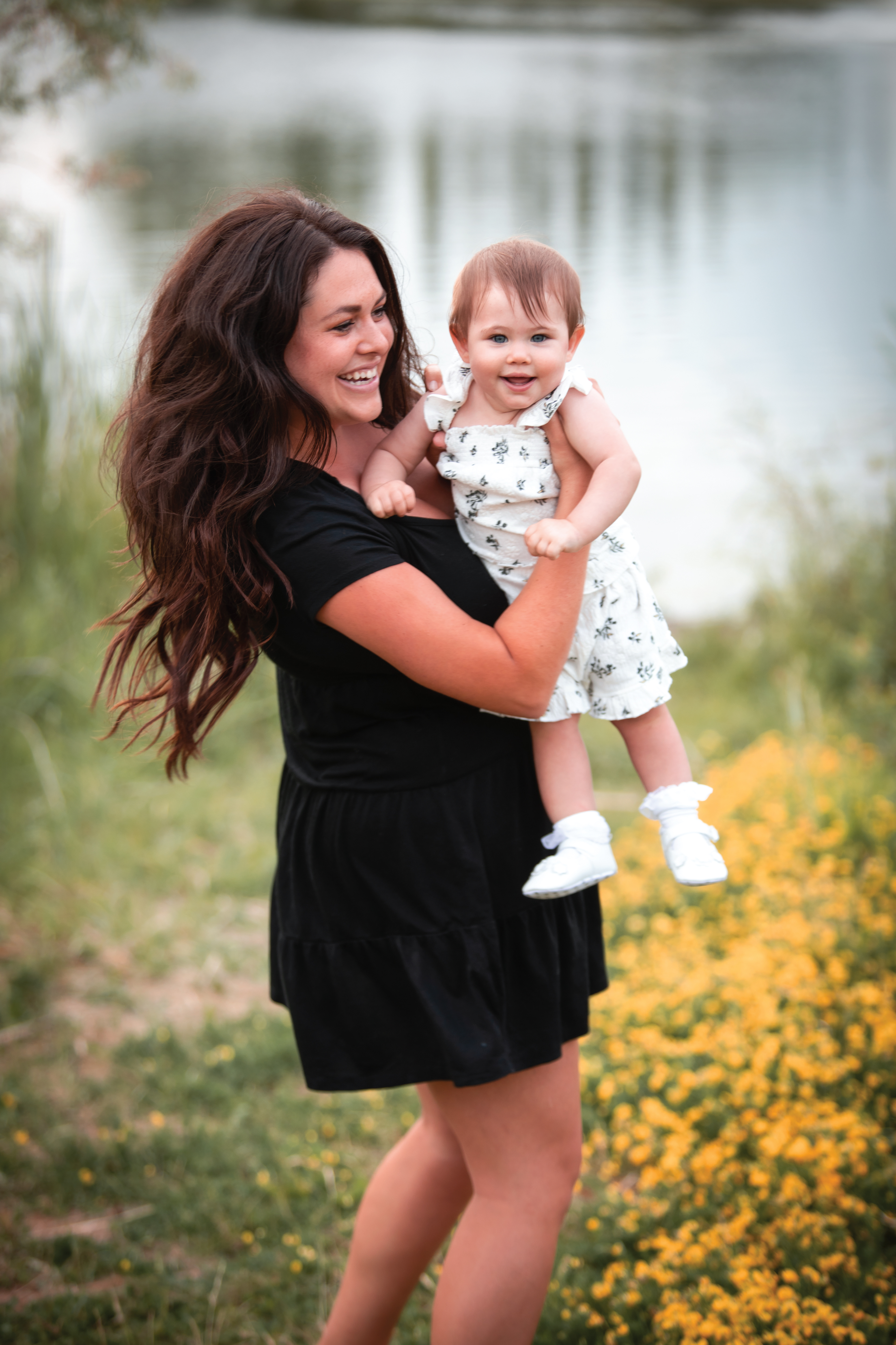 mom and her baby laughing